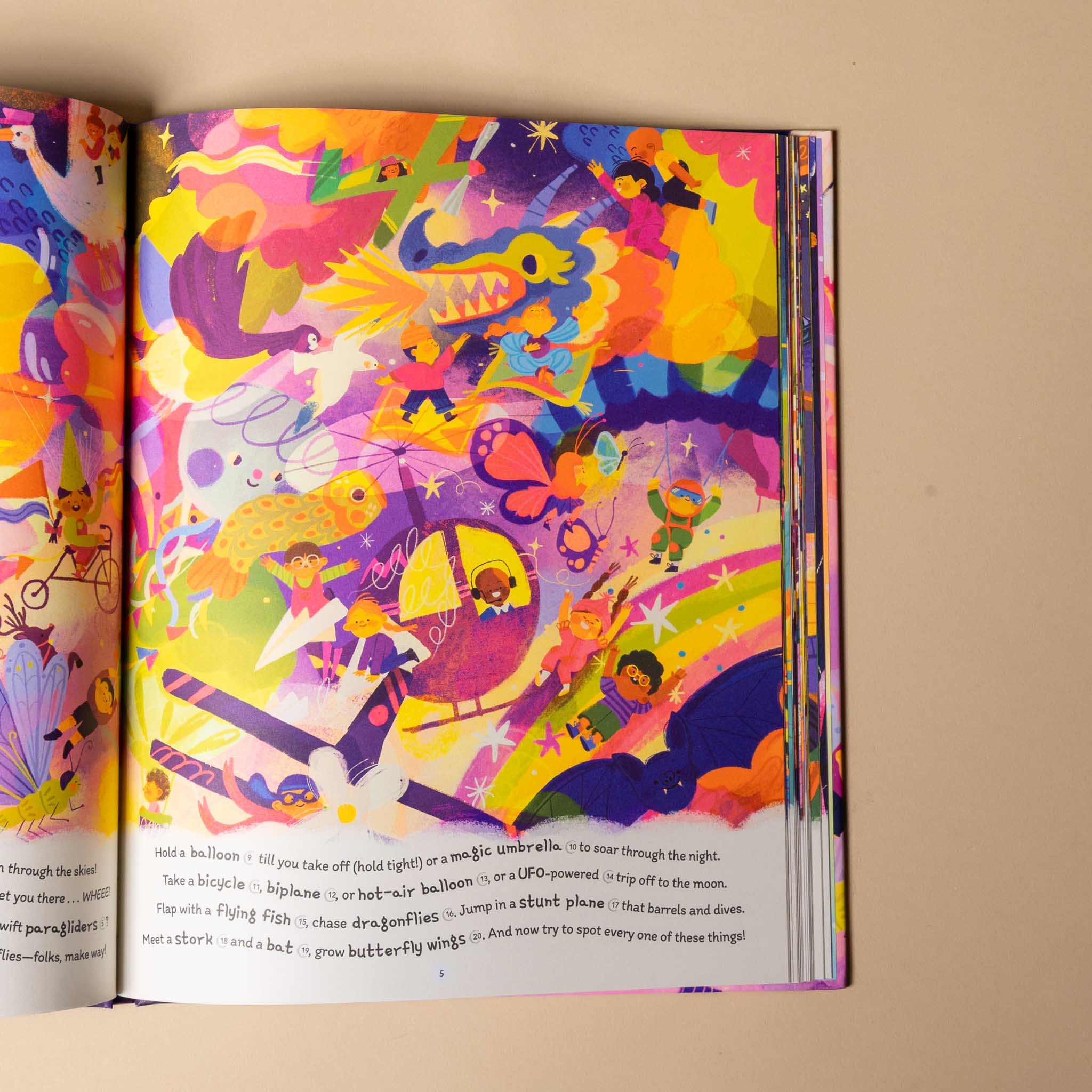 Open 500-dreams-a-seek-and-find with colorful illustrations on a beige background