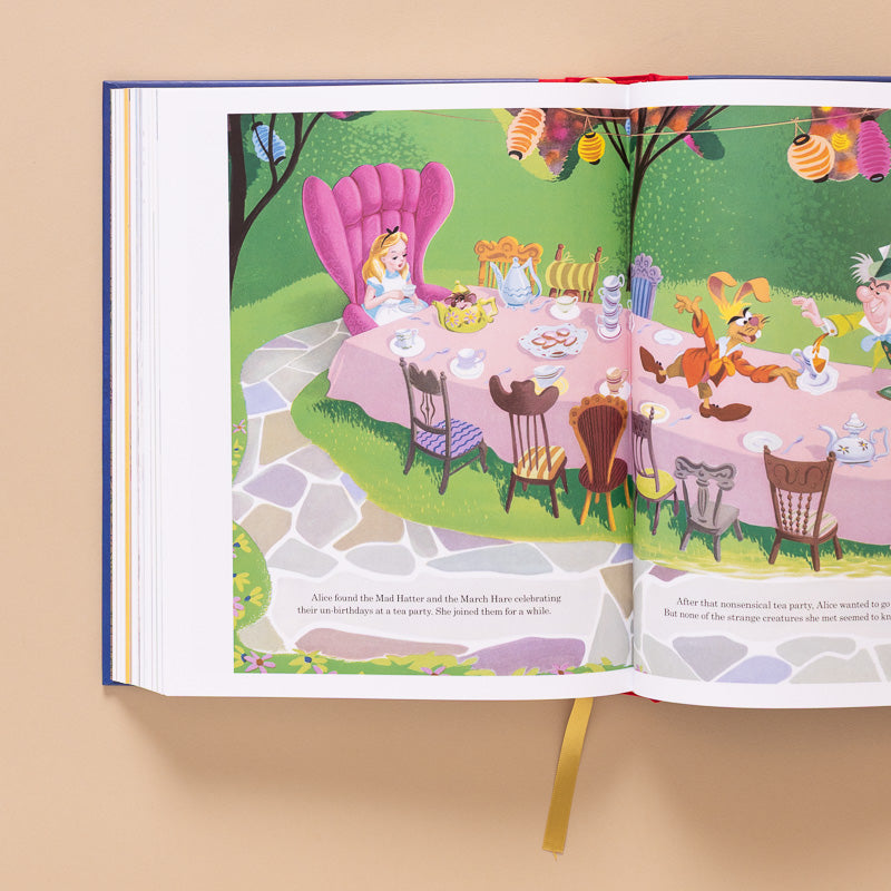 Walt DISNEY Children's classic book open page to alice in wonderland