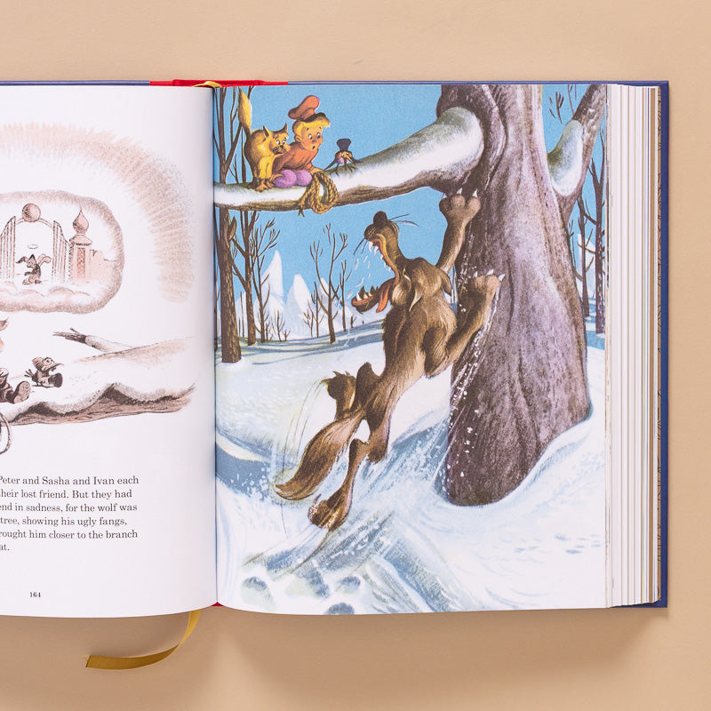 Walt DISNEY Children's classic book open page with peter and the wolf