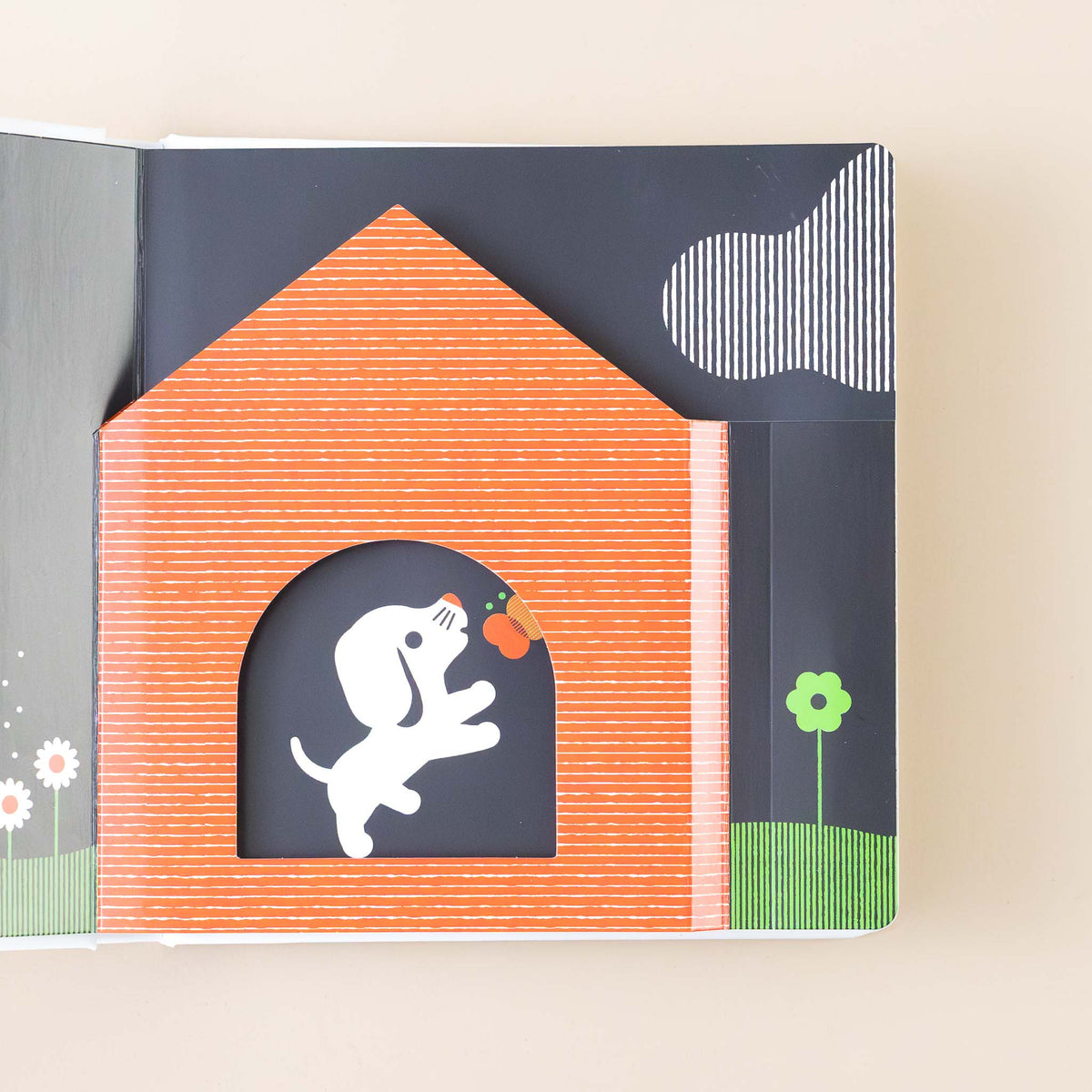 animals-at-home-board-book-interior-page-puppy-chasing-butterfly-next-to--red-dog-house