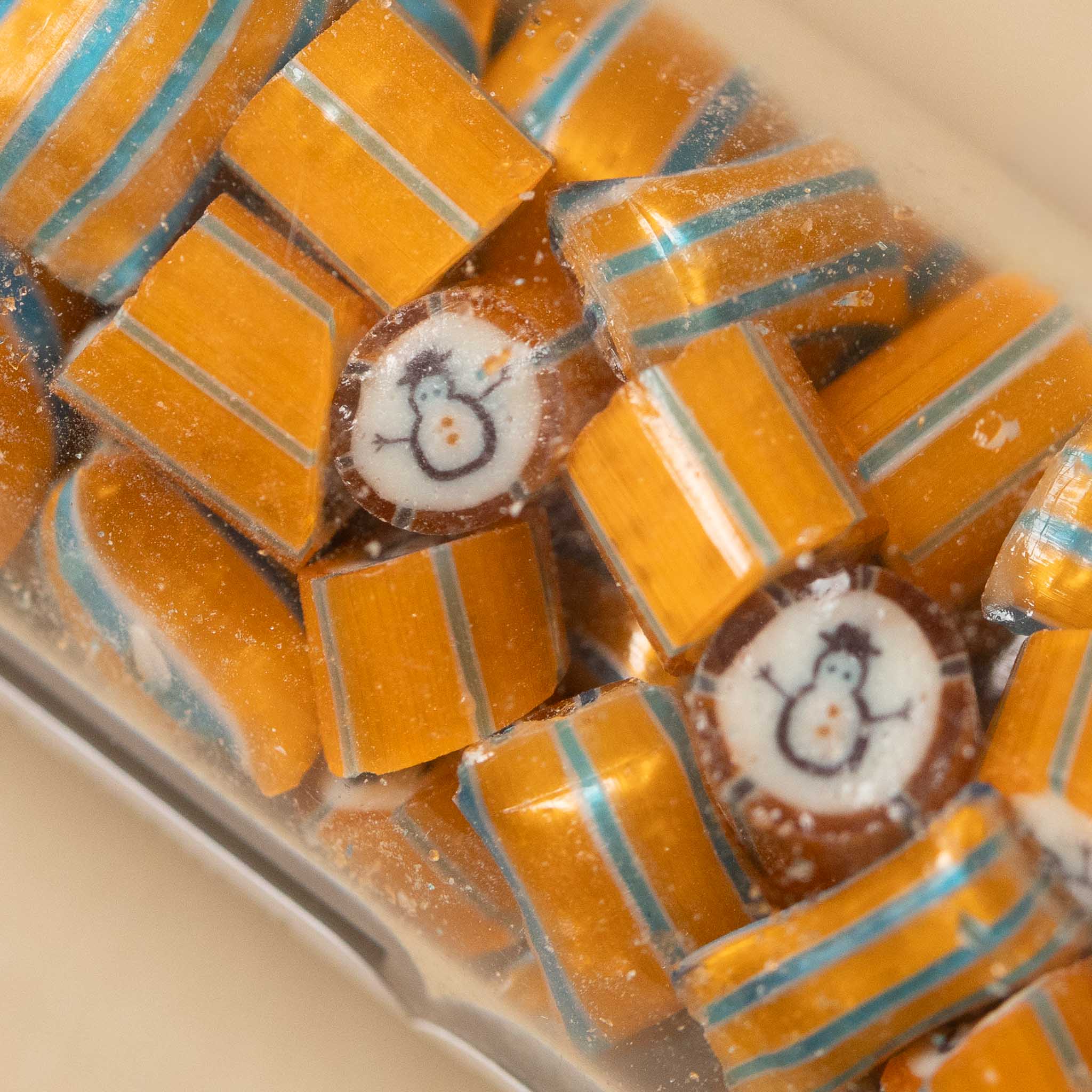 artisanal-hard-candy-tube-orange-snowman