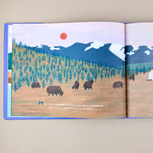 Load image into Gallery viewer, open-book-page-showing-illustration-of-bison-family-ini-front-of-mountains-and-forest