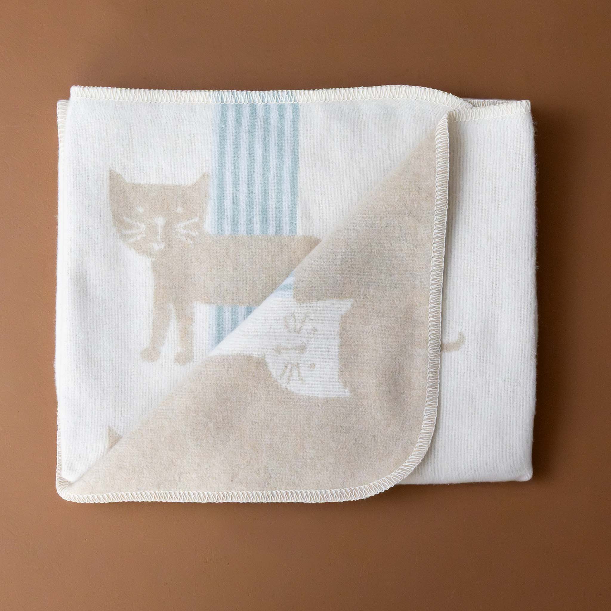 baby-blanket-stripey-cat-ecru-and-tan-with-blue-detail