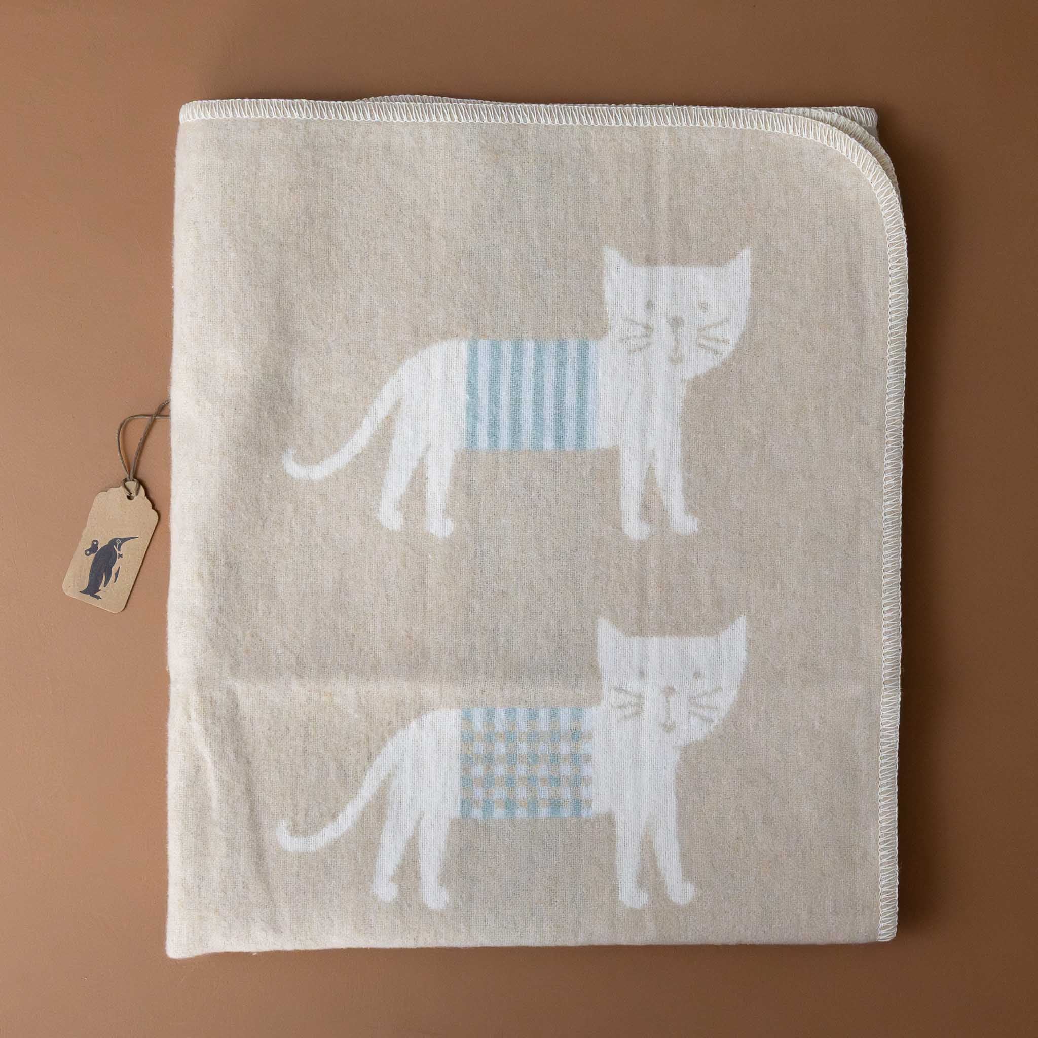 baby-blanket-stripey-cat-ecru-and-tan-with-blue-detail