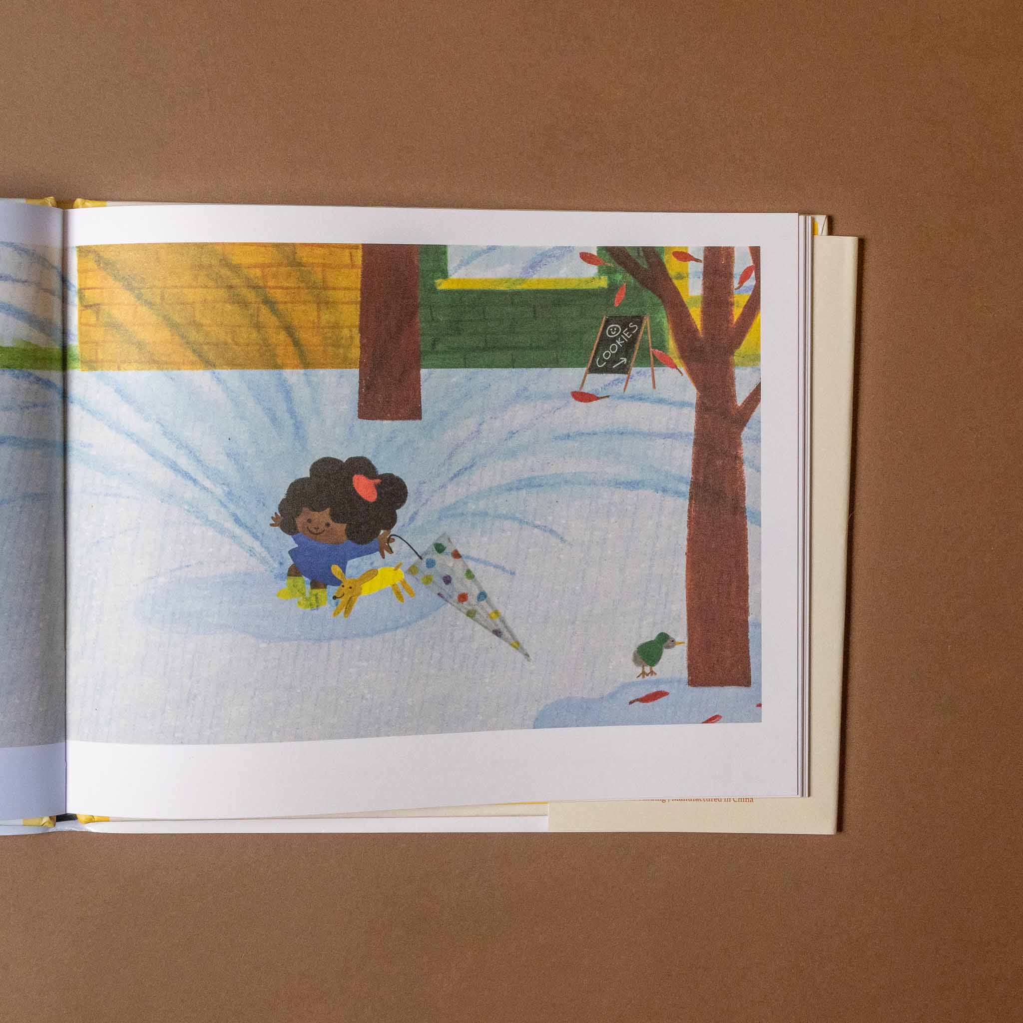 bookie-and-cookie-turn-the-page-book Illustration of a child jumping in the puddle with a dog on a brown background
