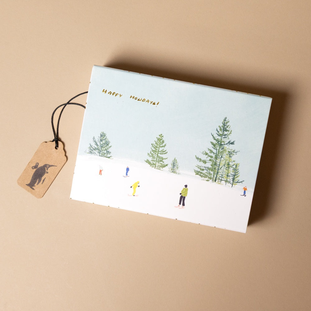 boxed-note-card-set-winter-activities with winter scene and 'Happy Monday!' text on a beige background