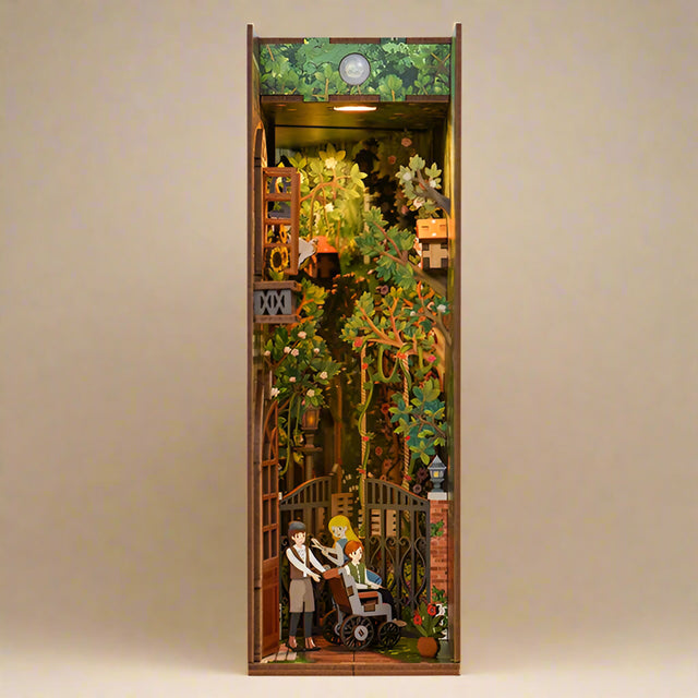 finished-book-nook-with-3-children-in-secret-garden