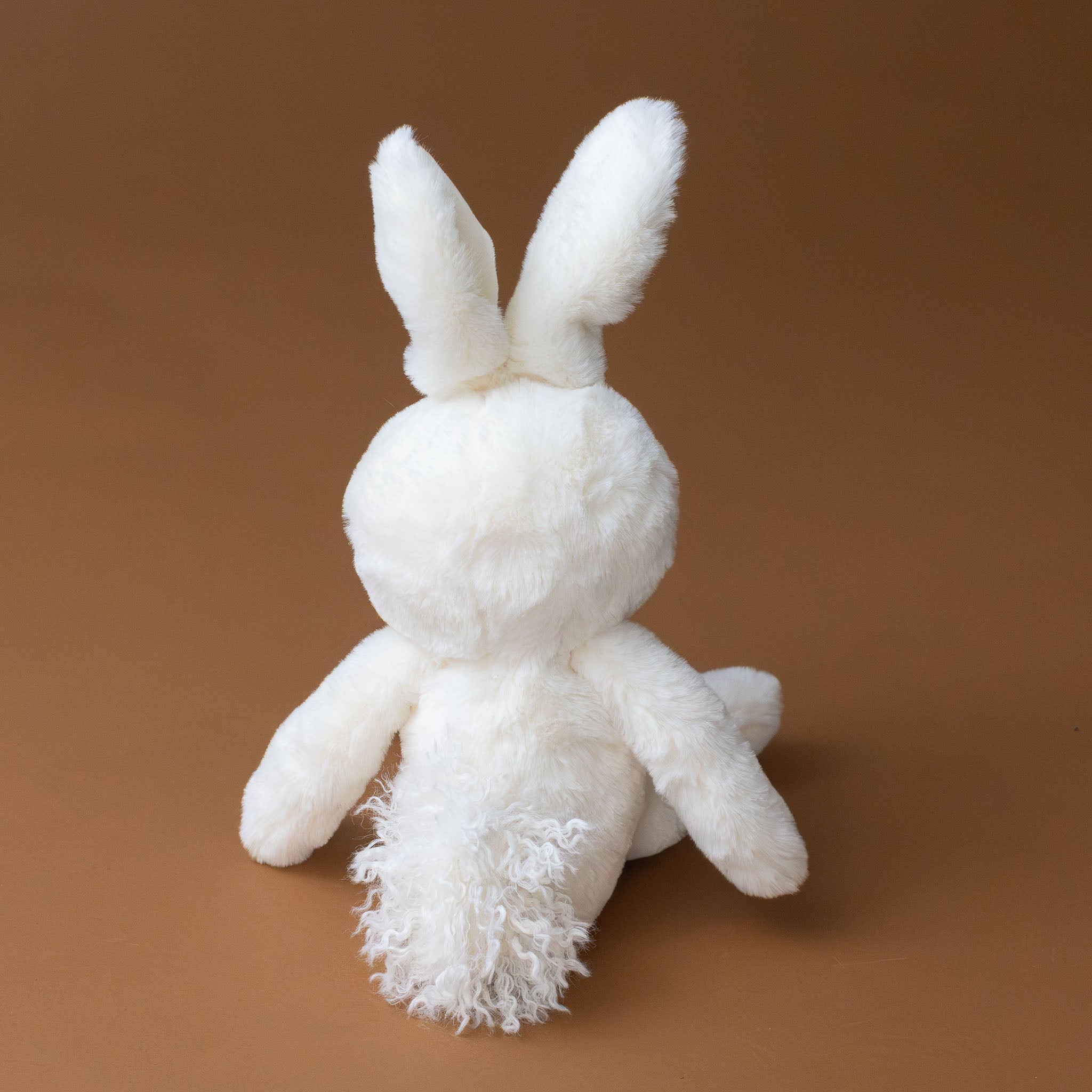 white-bun-bun-bunny-with-curly-pom-pom-tail