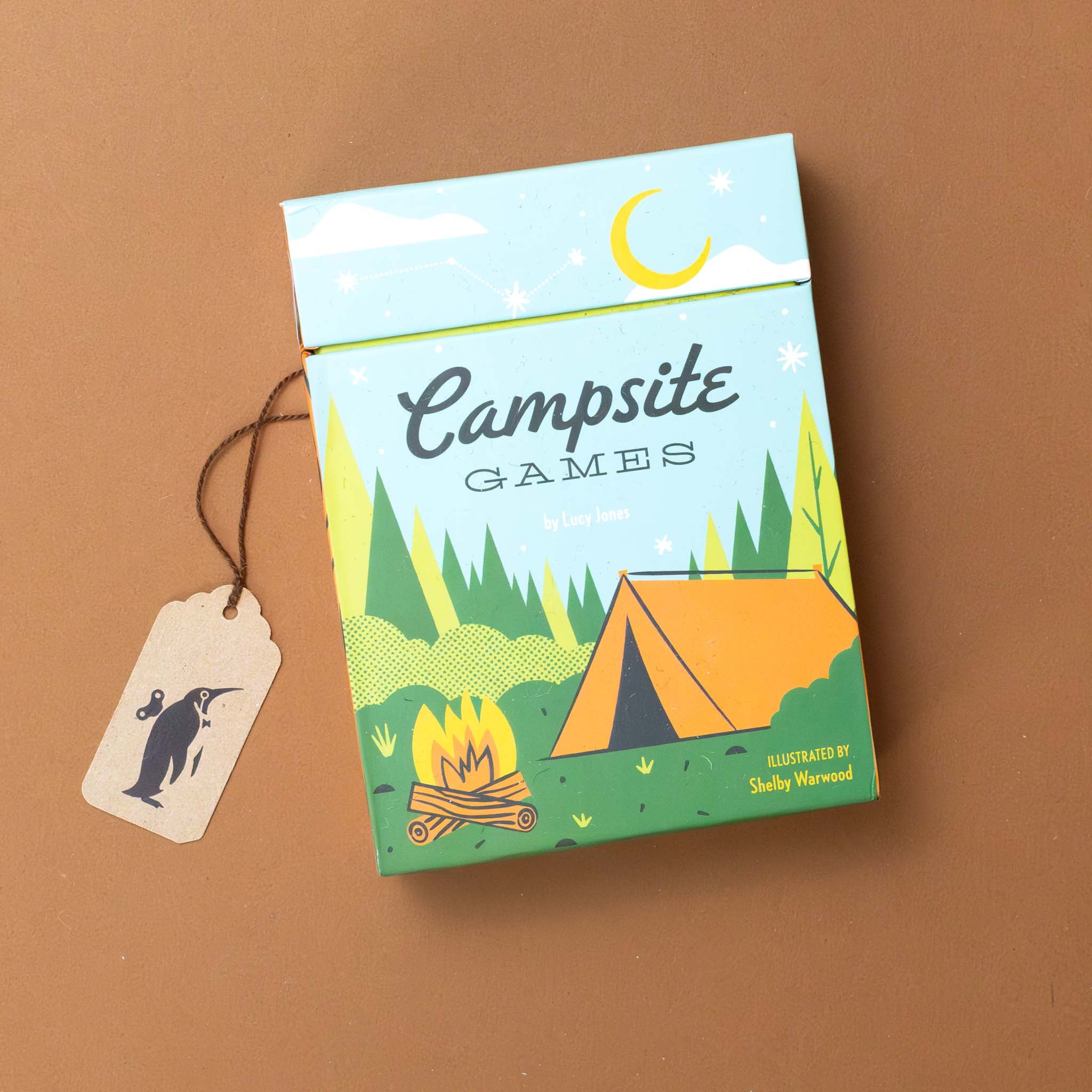 campsite-games-box-with-tent-and-campfire-in-woods
