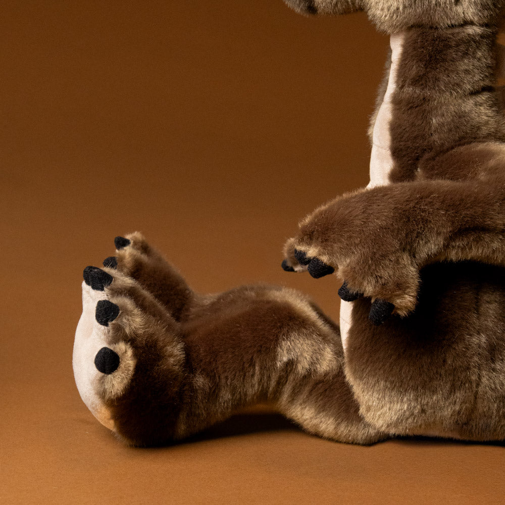clubs-the-dragon-grey-stuffed-animal-paws