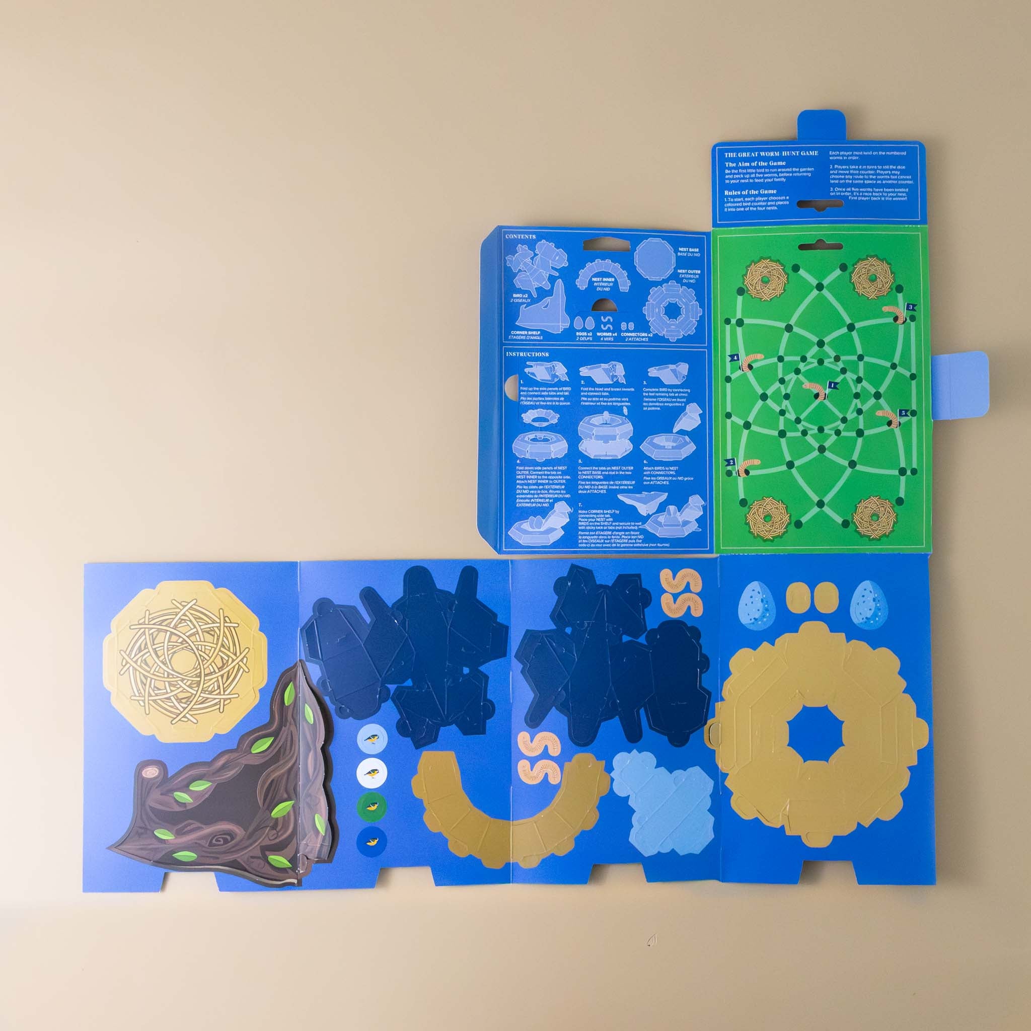 create-your-own-blue-tit-family-and-nest-kit-opened-showing-game-and-die-cut-pieces-for-assembly