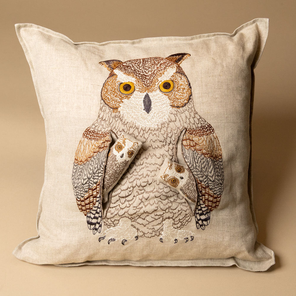 embroidered-pocket-pillow--mama-owl with an owl and owlets design on a beige background