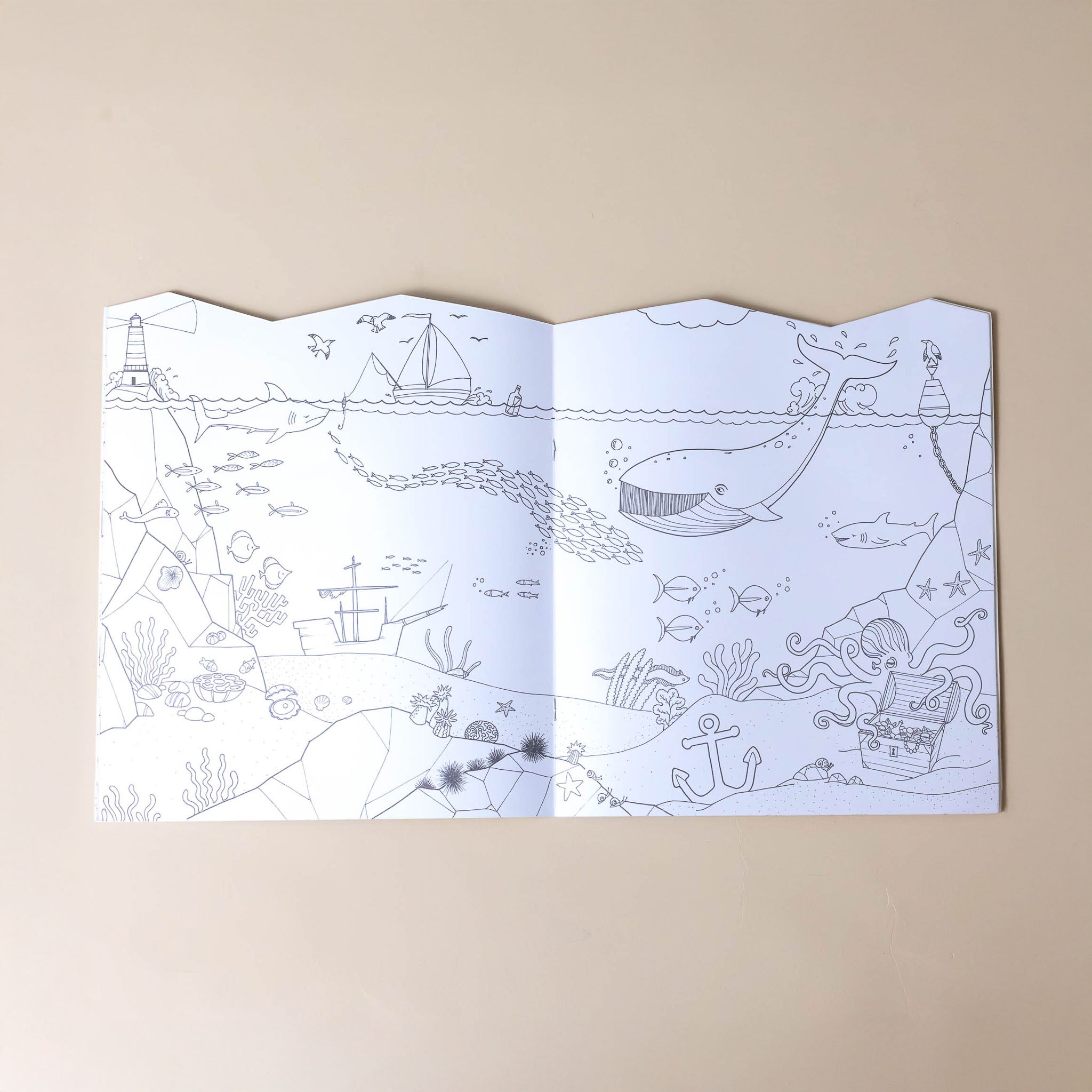 explore-the-world-coloring-and-sticker-book-interior-coloring-page-of-a-scene-with-boats-lighthouse-fish-whales-shipwreck-treasure