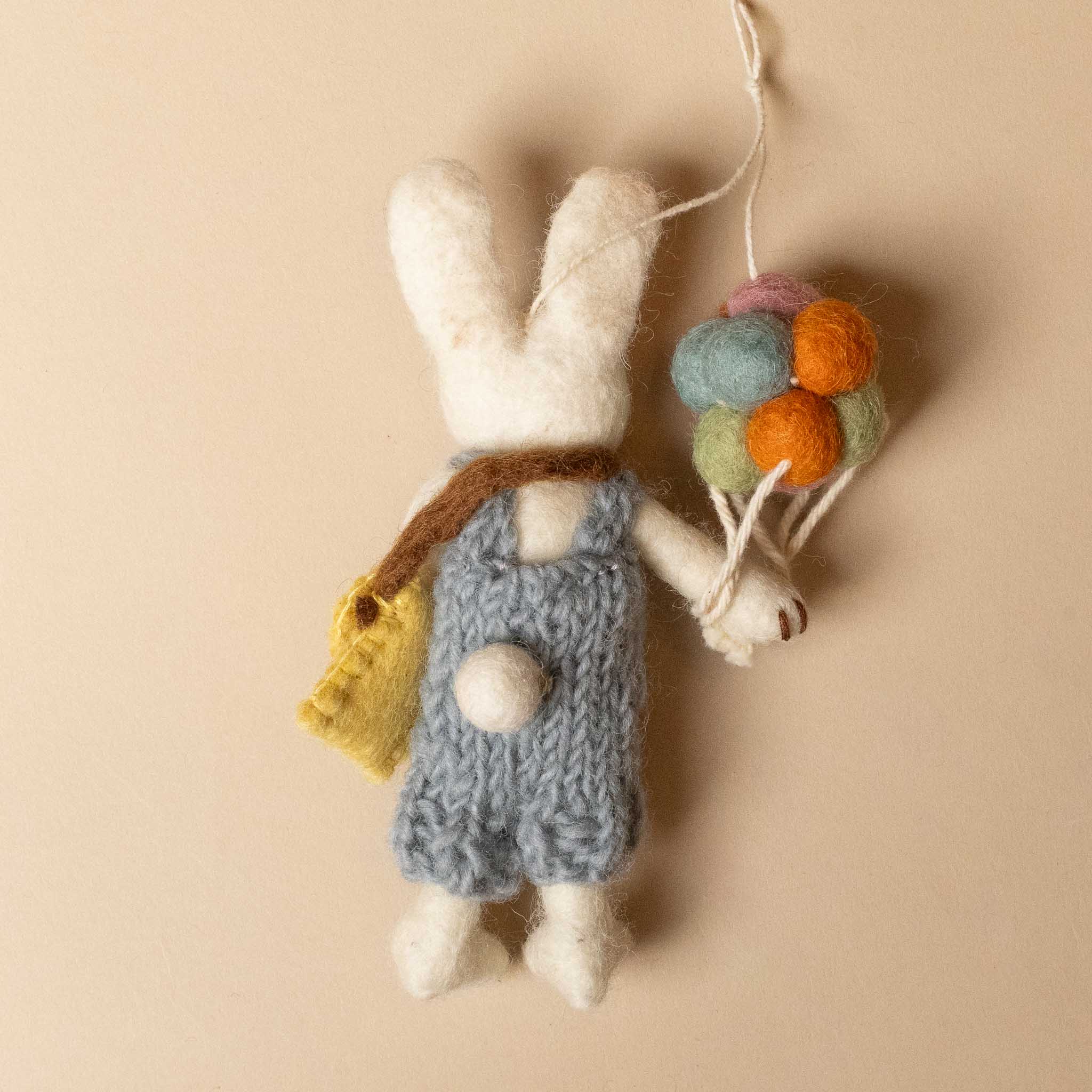 felted-white-rabbit-ornament--blue-overalls-with-balloon-bouquet