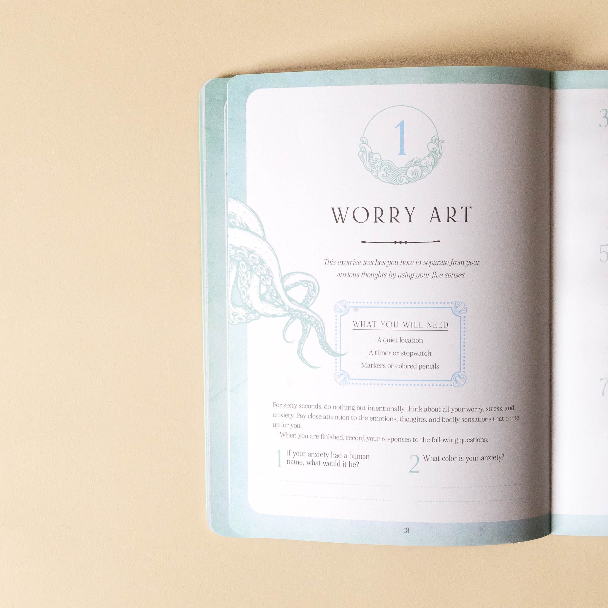 Open find-your-calm book with a page titled 'Worry Art' on a beige background