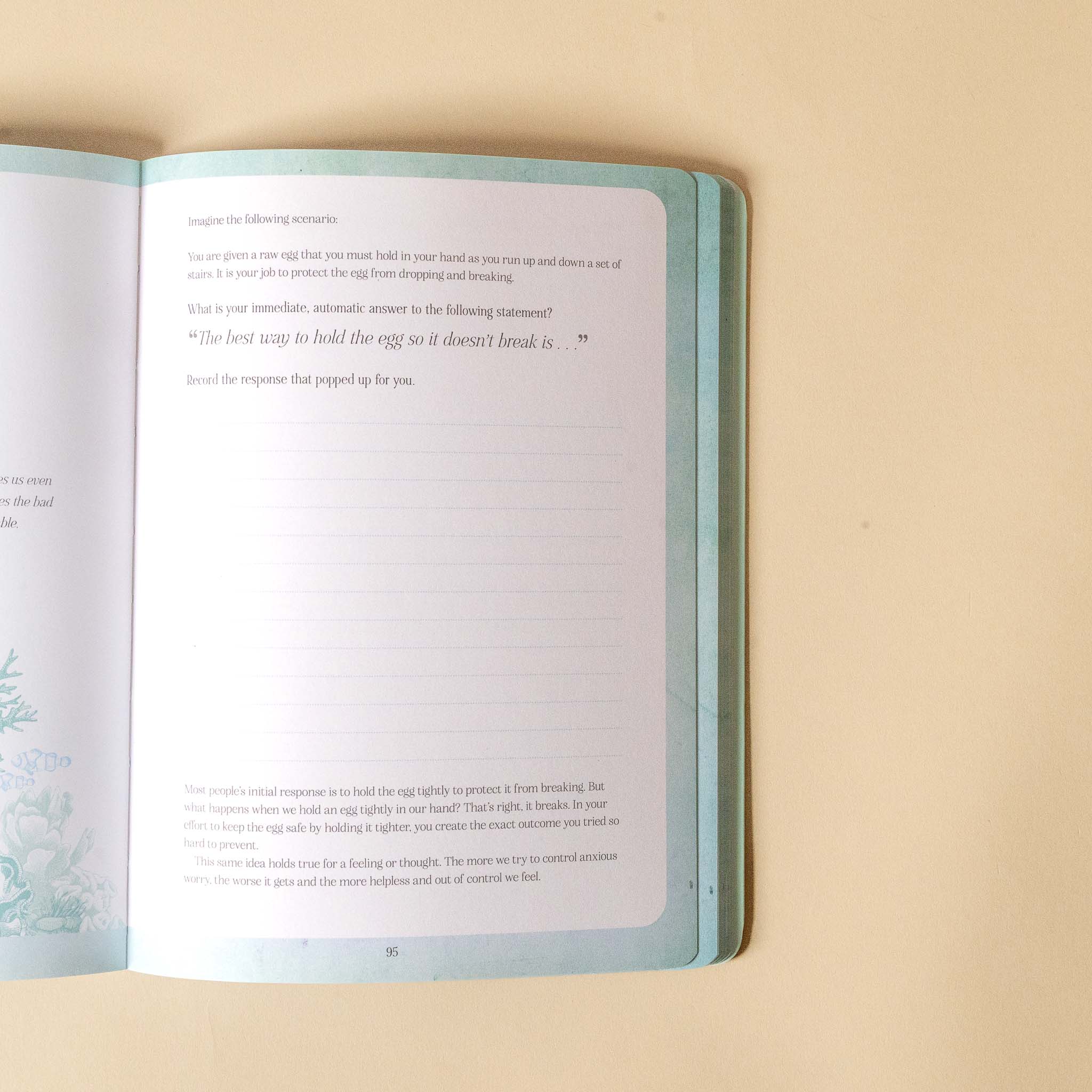 Open find-your-calm-open-book with text and a minimalistic design on a beige background
