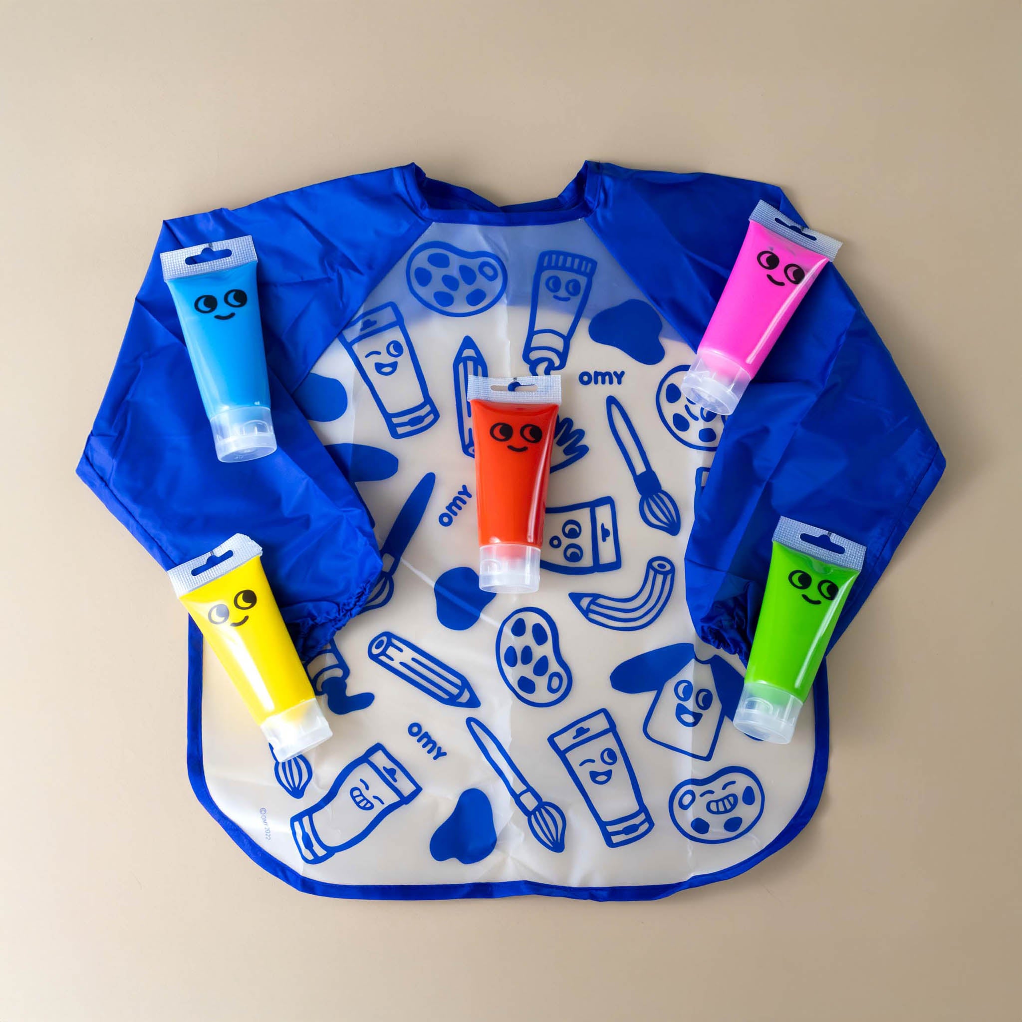 finger-painting-kit-smock-with-blue-pink-yellow-red-and-green-paints-with-big-eyes-and-smile