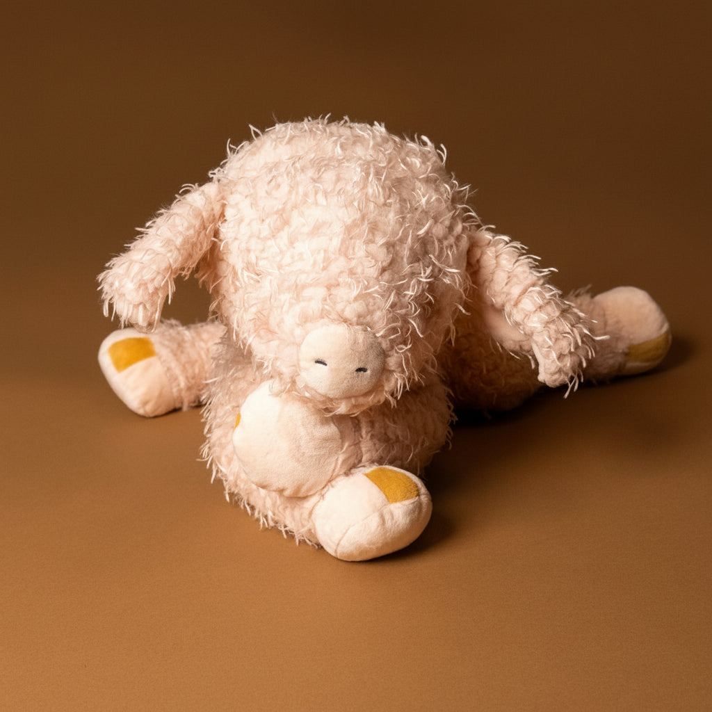 hammie-the-pig--large-stuffed-animal-blush-pink-laying