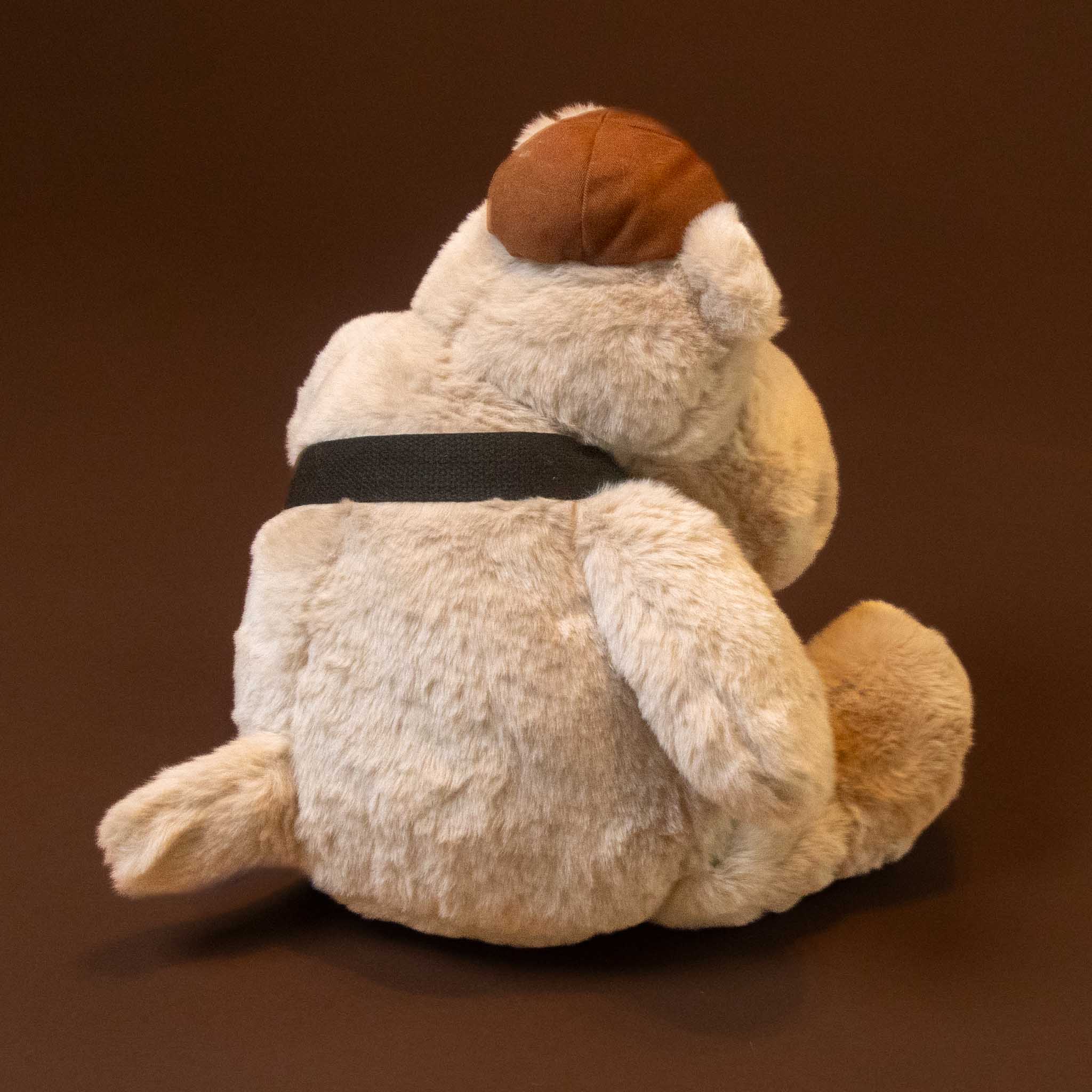 hip-hippo-world-traveler-grand with hat and bag stuffed animal