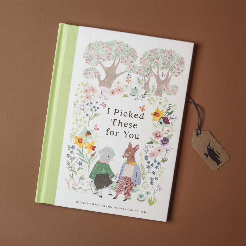Book titled 'I Picked These for You' with illustrations on a brown background