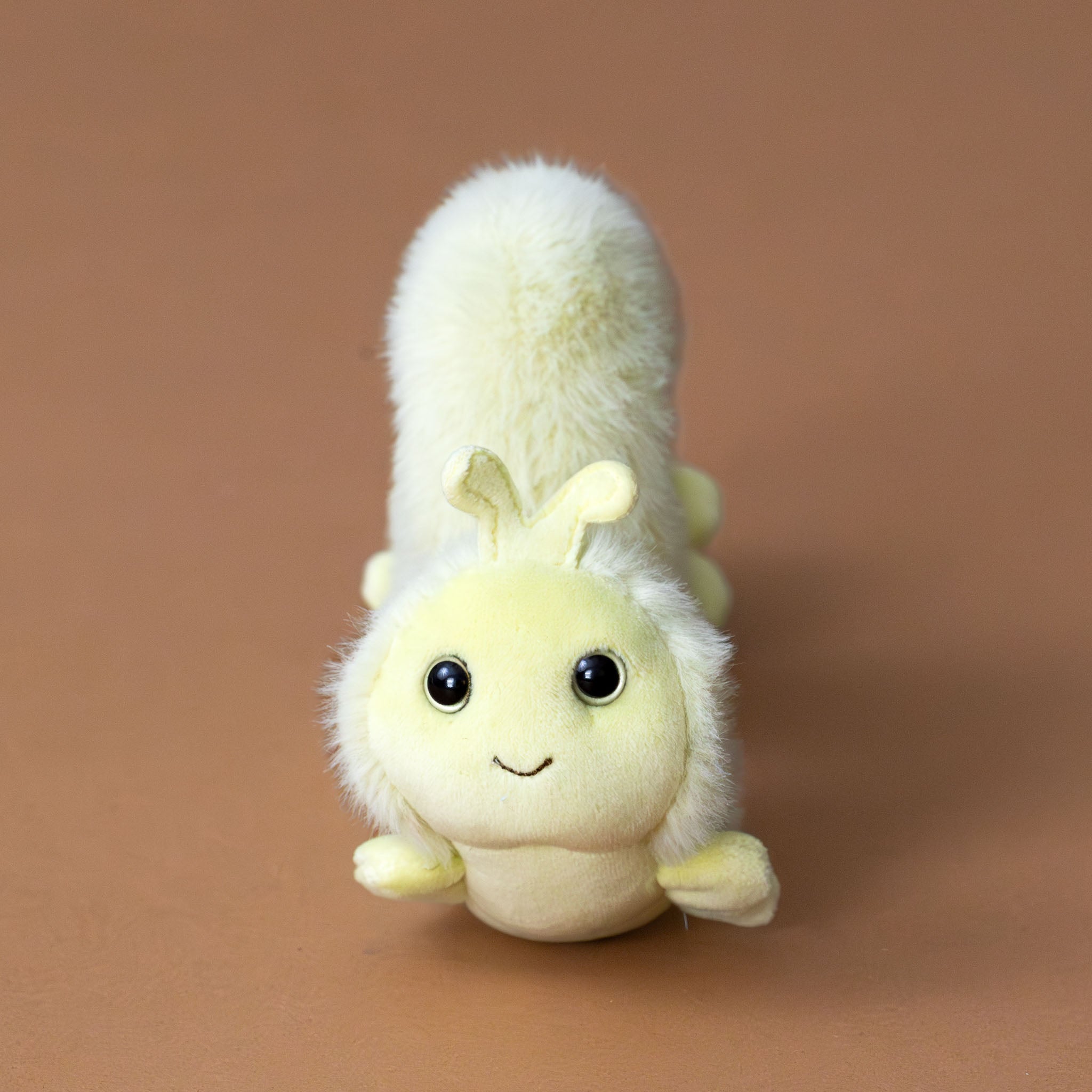 inchy-the-inchworm-yellow-fuzzy-body-stuffed-animal-side-face