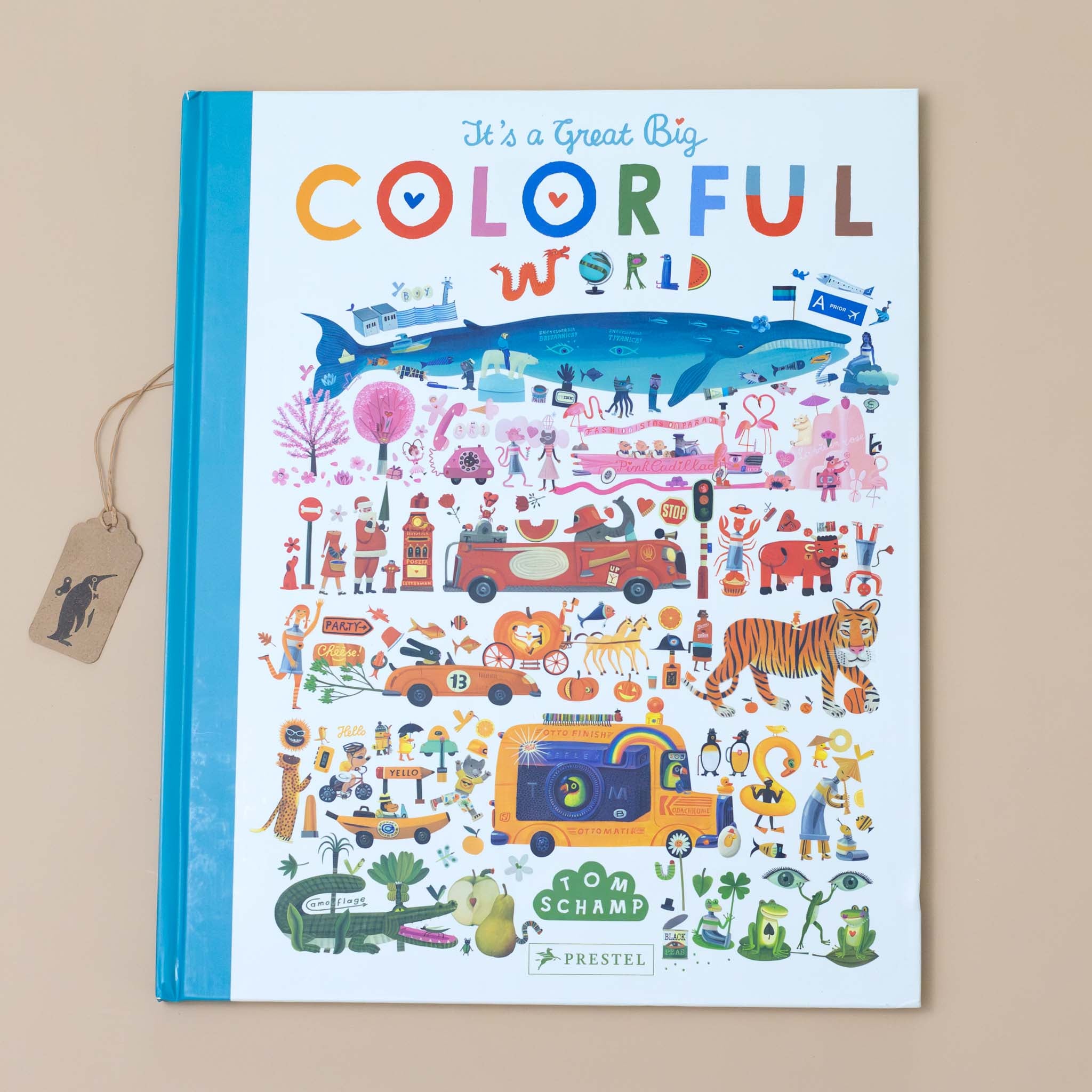 Analyzing image    its-a-great-big-colorful-world-book-cover-with-a-rainbow-of-images-from-an-green-alligator-to-yellow-school-bus-to-orange-tiger-to-red-lobster-pink-phone-blue-whale