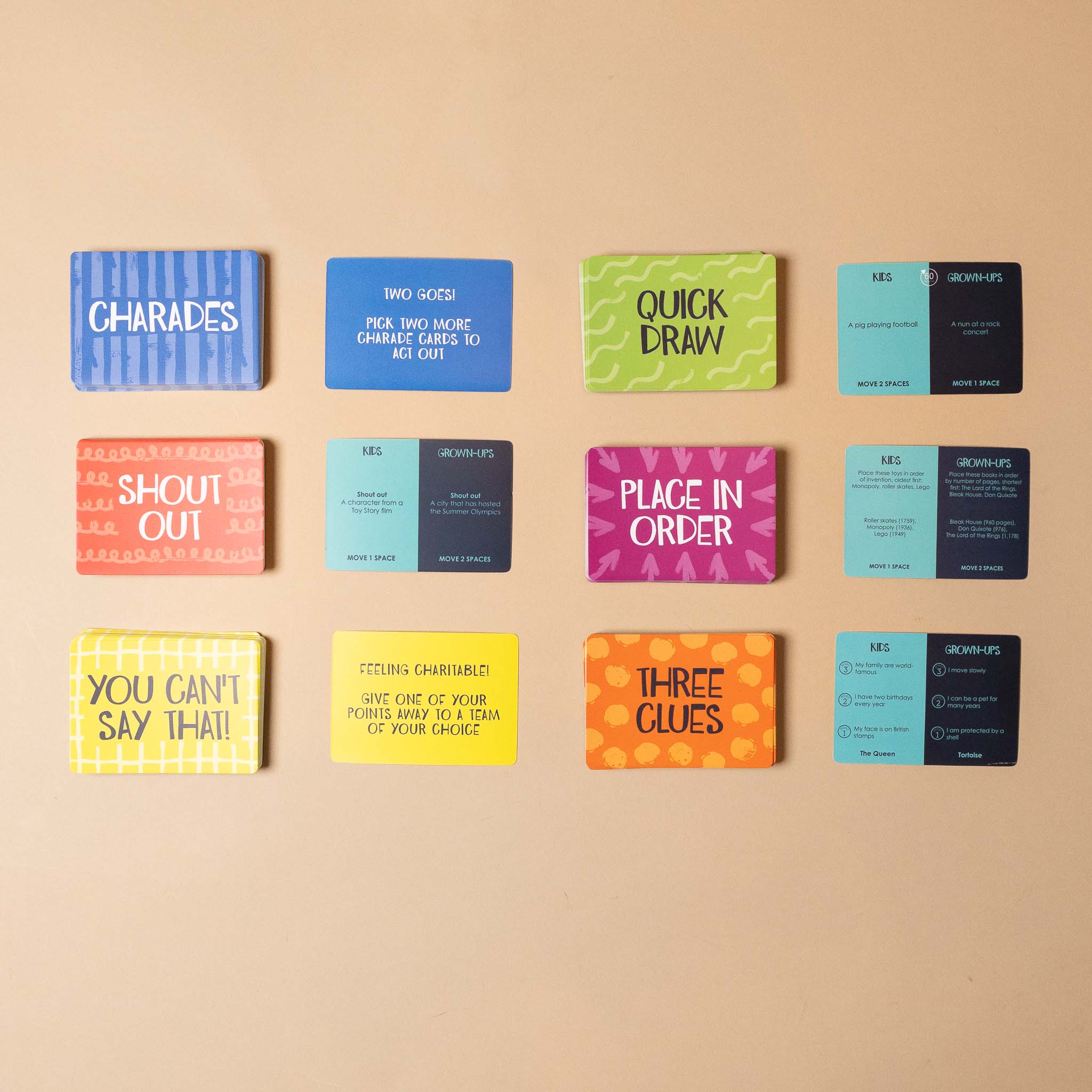 kids-vs-grown-ups-game-time Collection of colorful game cards on a beige background
