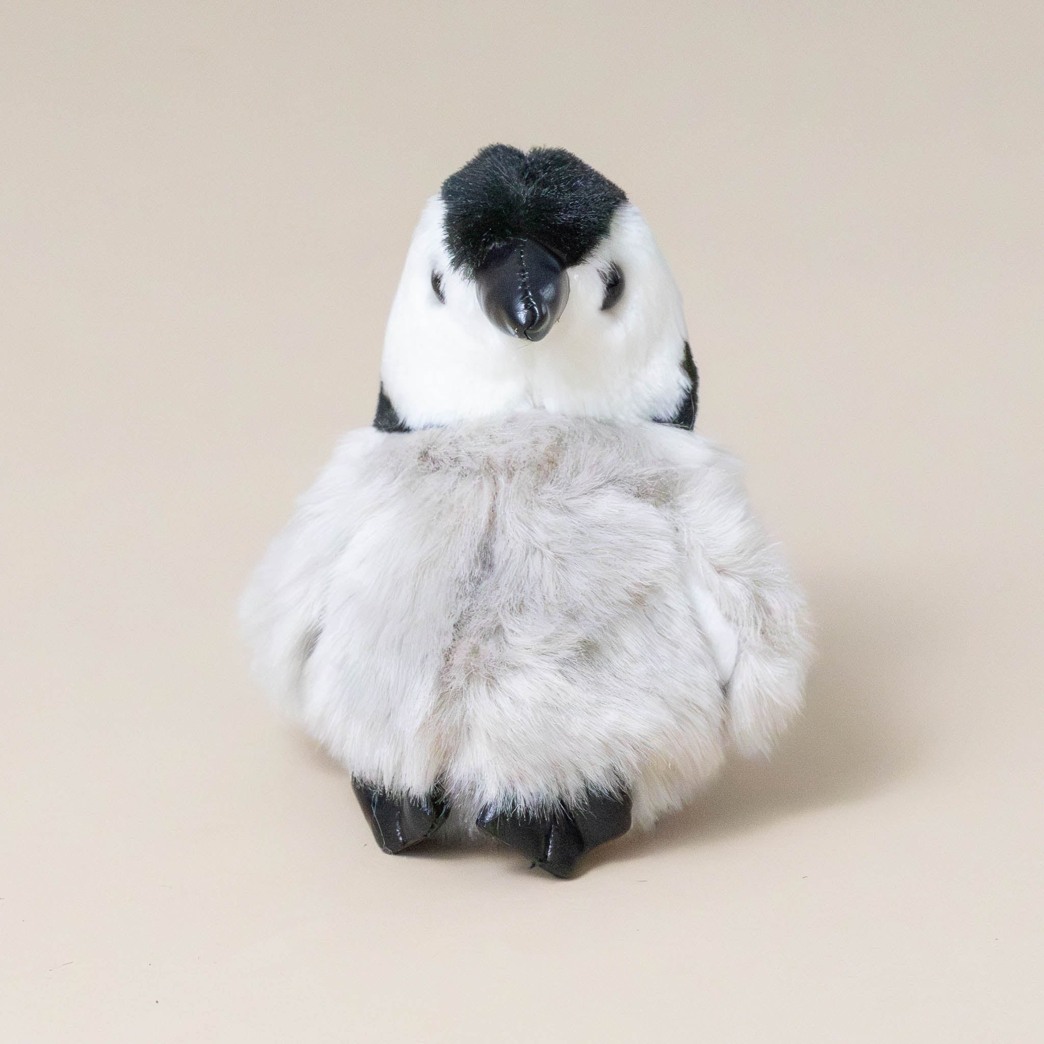 little-grey-white-and-black-penguin-chick-finger-puppet-front