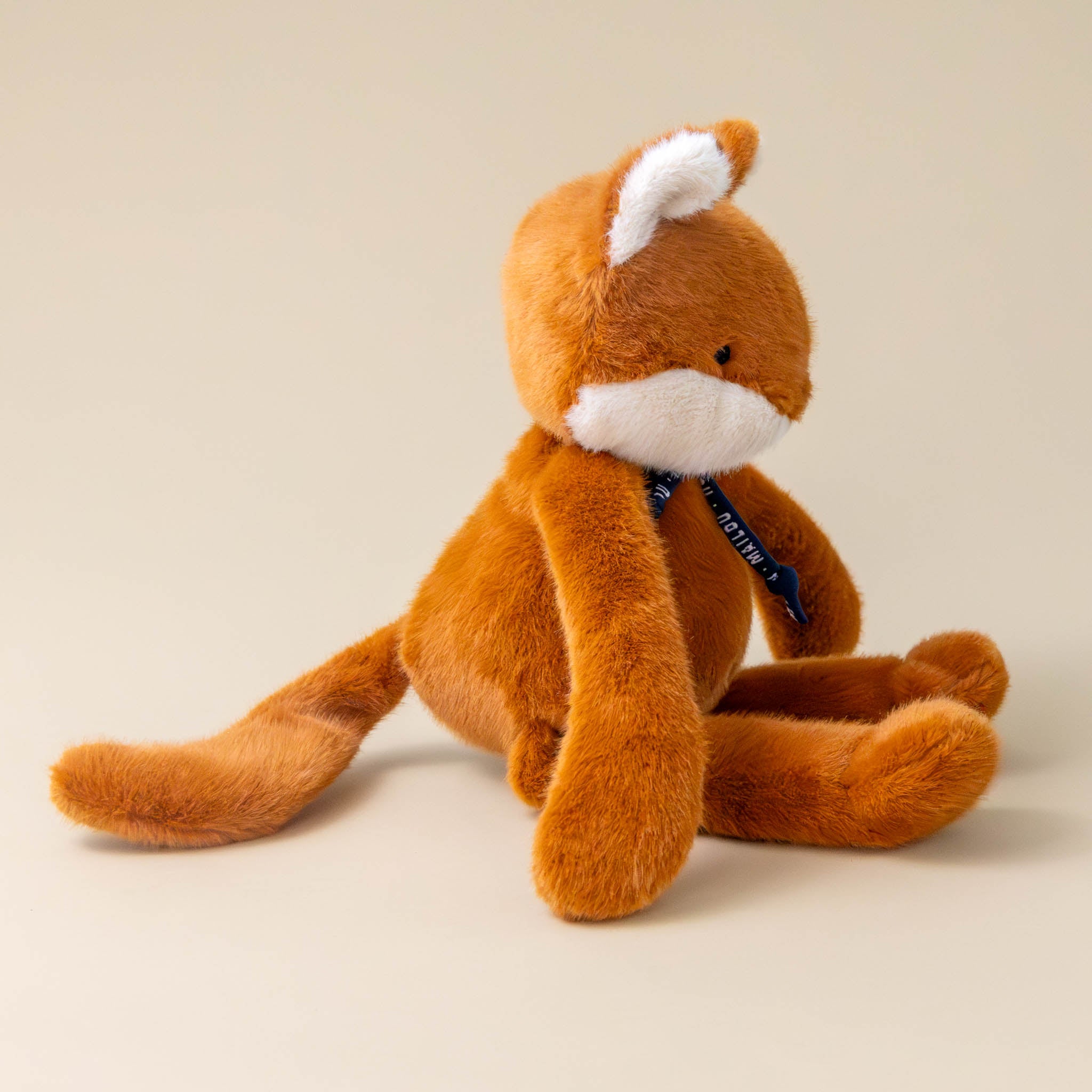 loulou-fox-doudou-orange-and-white-stuffed-animal-side-and-tail