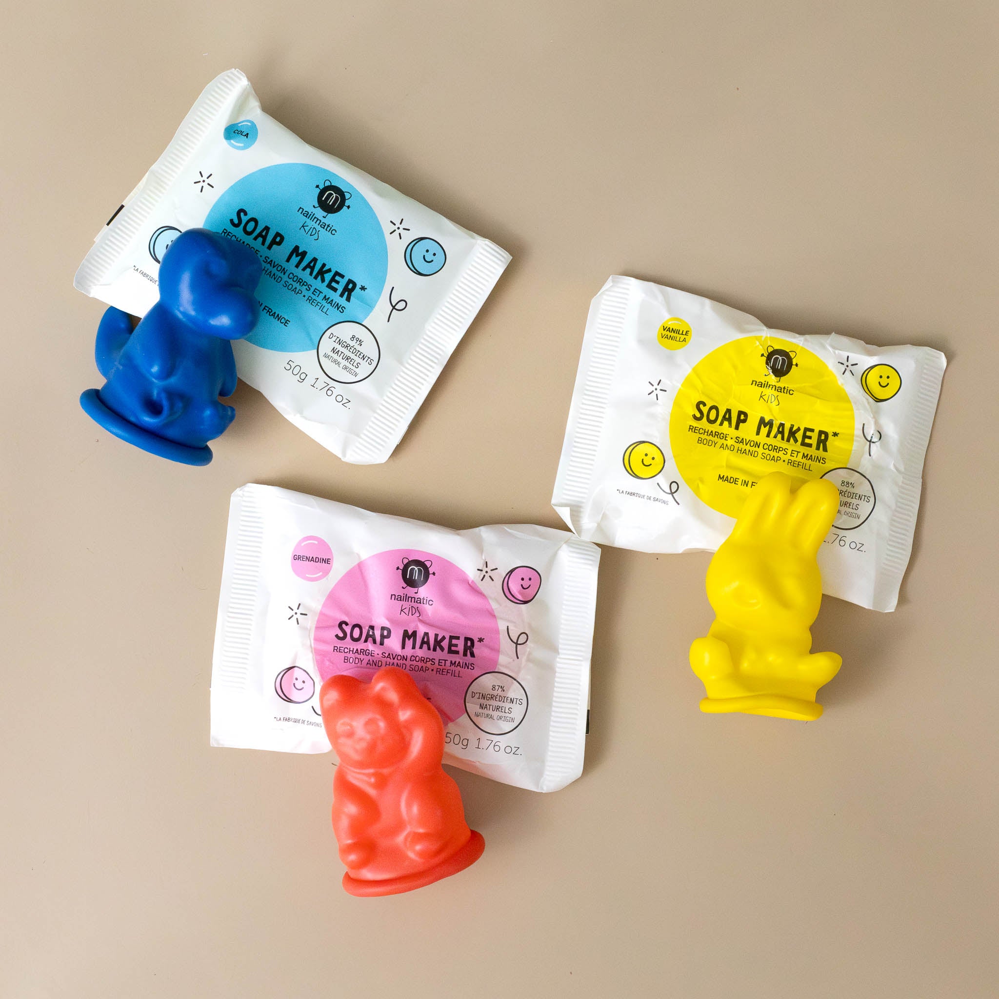 contents-of-the-kit-with-yellow-red-and-blue-molds-and-soap-packets