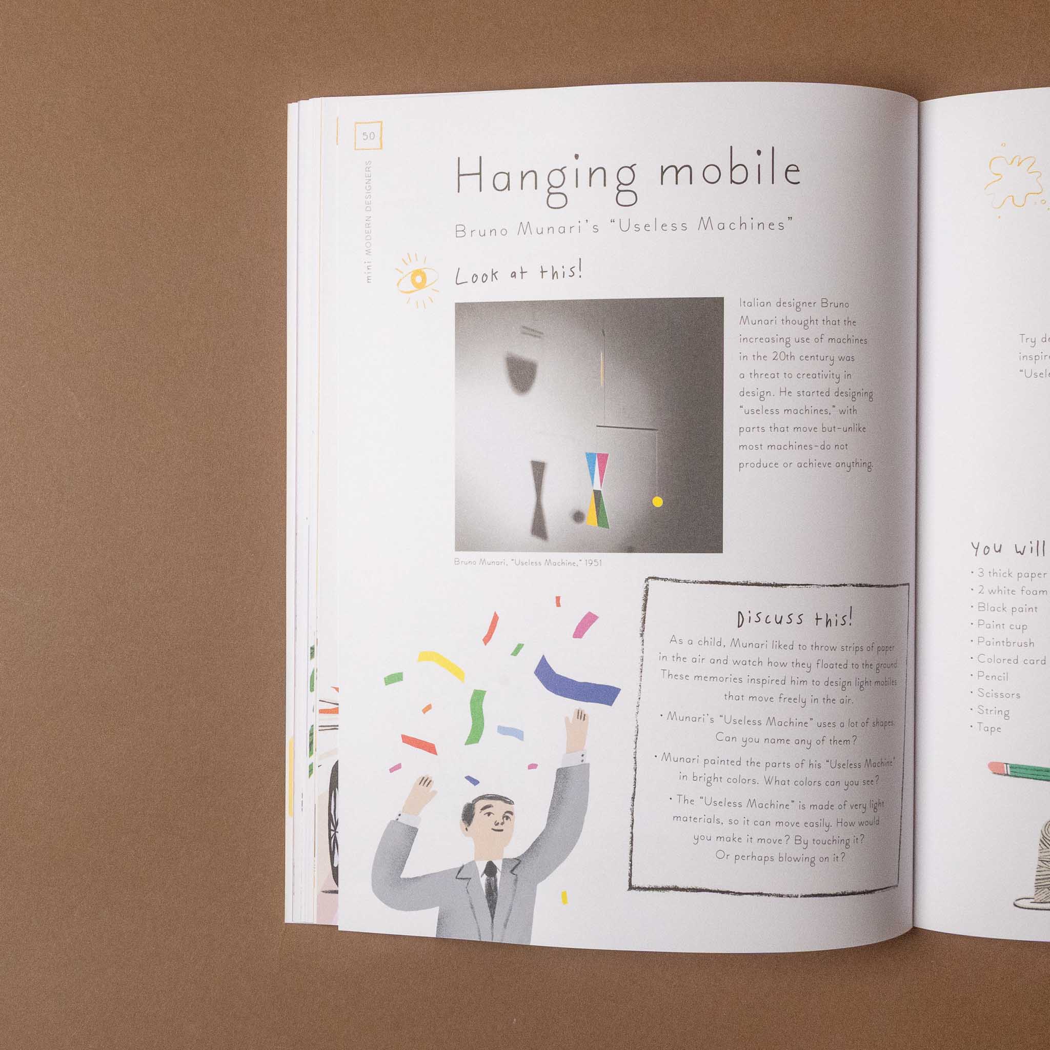 Open mini-designers-activity-book with educational content on a brown background