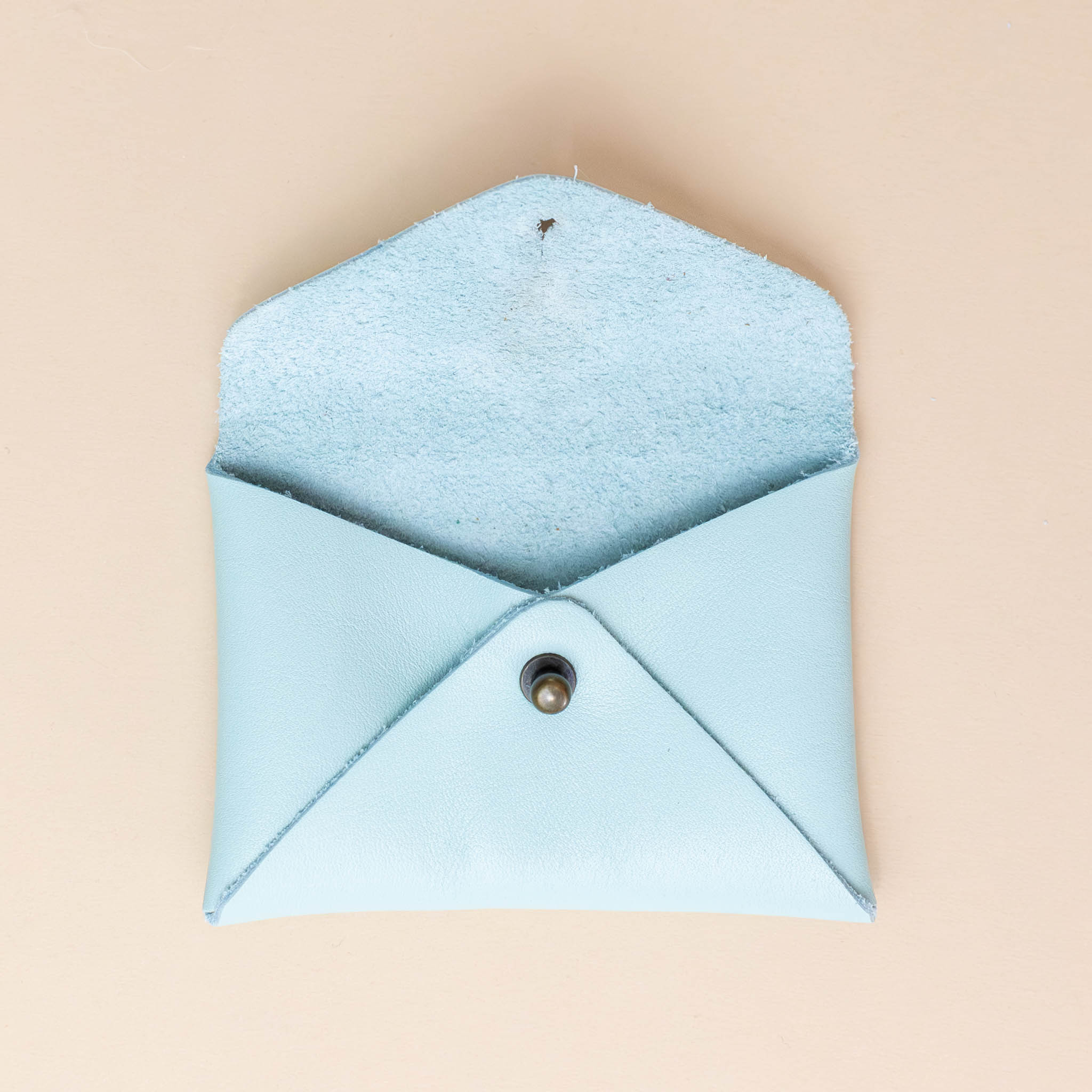 mini-gold-heart-centered-pouch-blue-beetle-