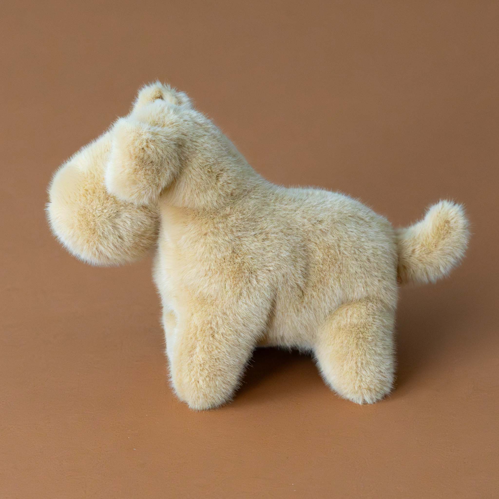 muzzle-tim-tan-pup-stuffed-animal-side-tail