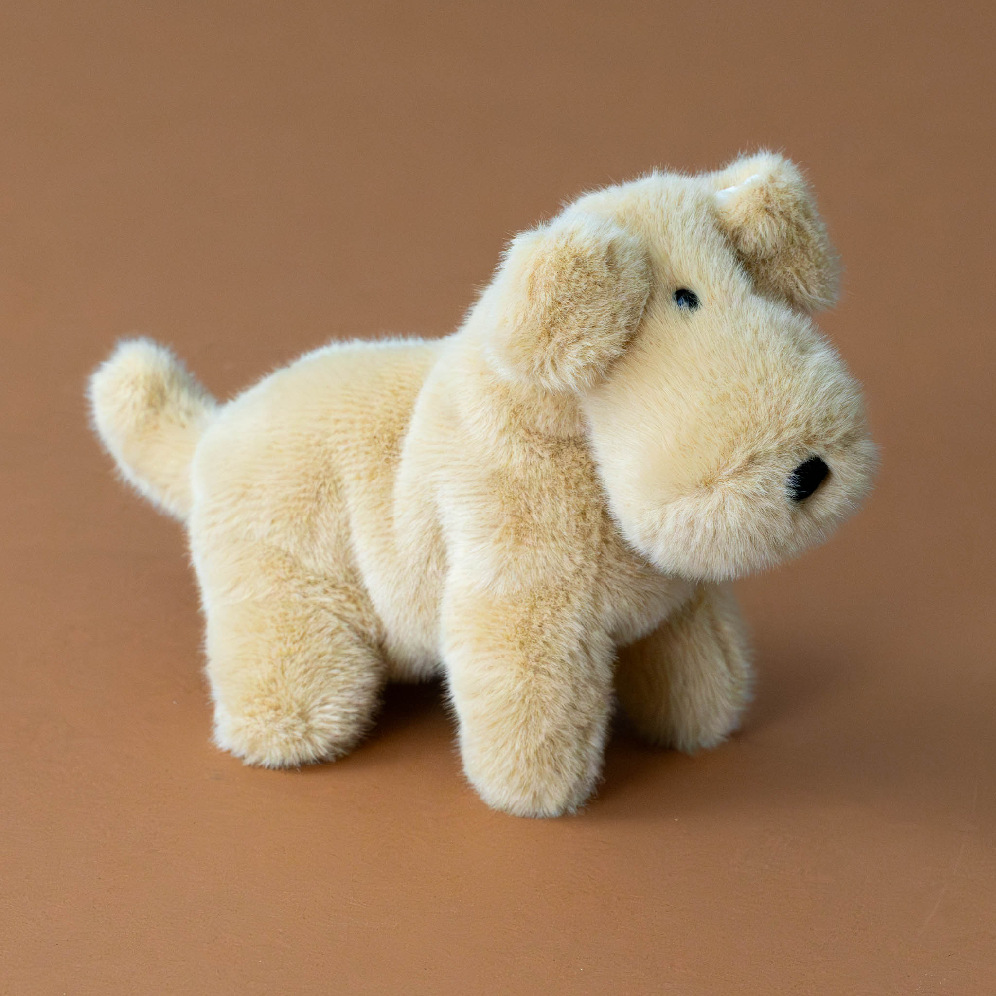 muzzle-tim-tan-pup-stuffed-animal-side