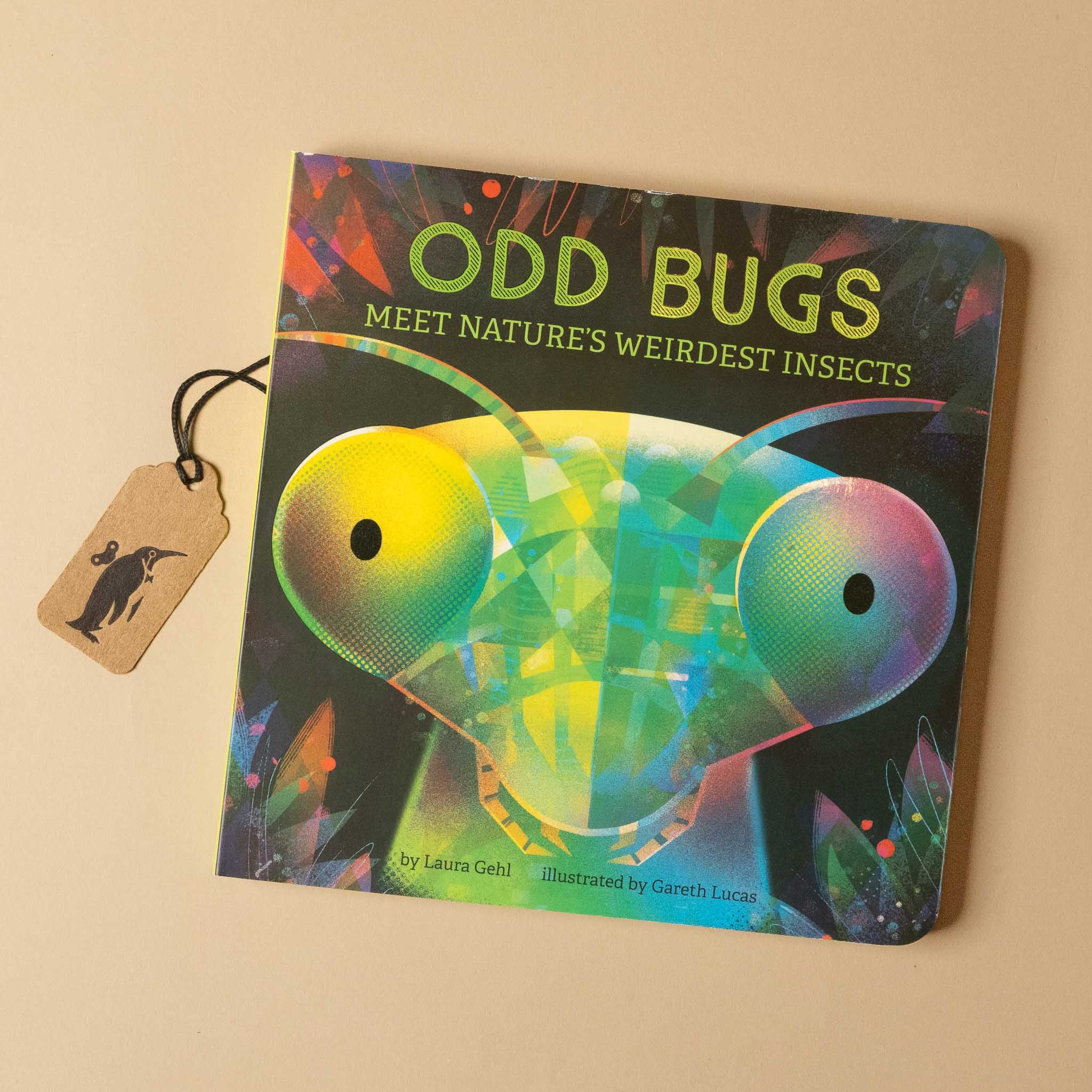 Book titled 'Odd Bugs: Meet Nature's Weirdest Insects' with a colorful insect illustration on a beige background.
