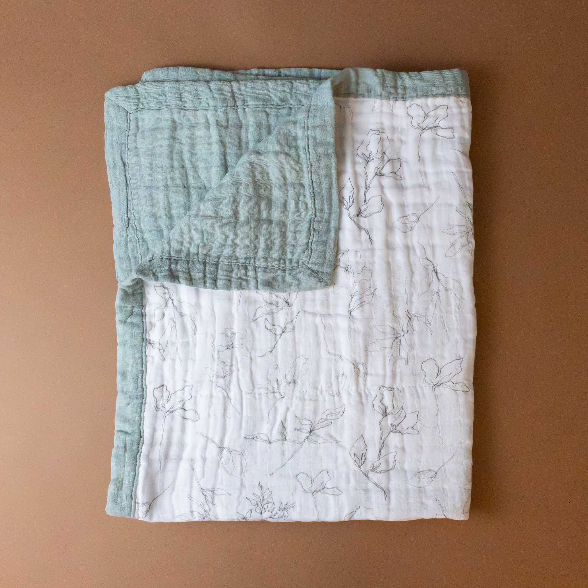 organic-cotton-muslin-blanket-pencil-floral-with-white-sage-trim
