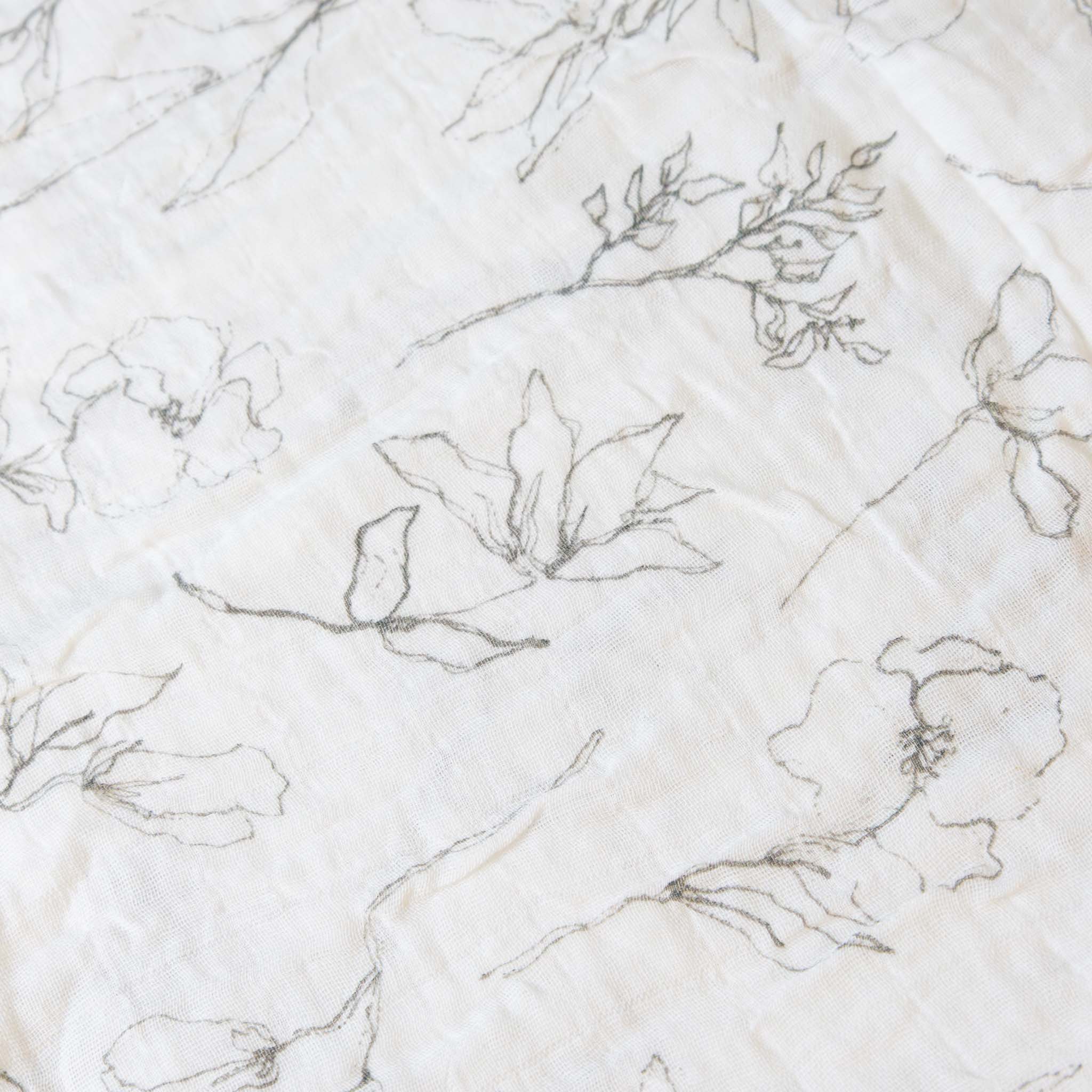organic-cotton-muslin-swaddle-pencil-floral-grey-delicate-floral-pattern-detail