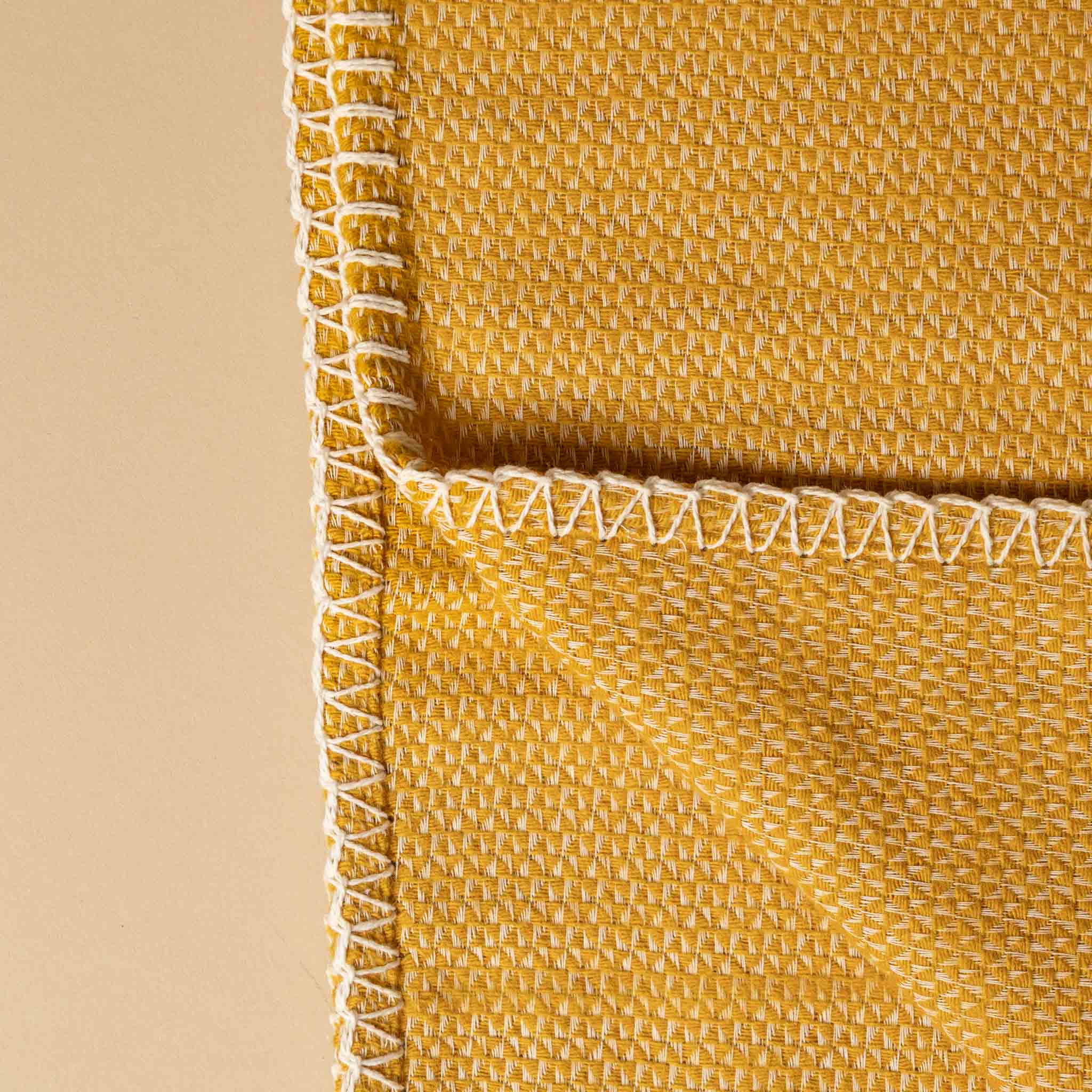 organic-cotton-stitch-blanket-ochre