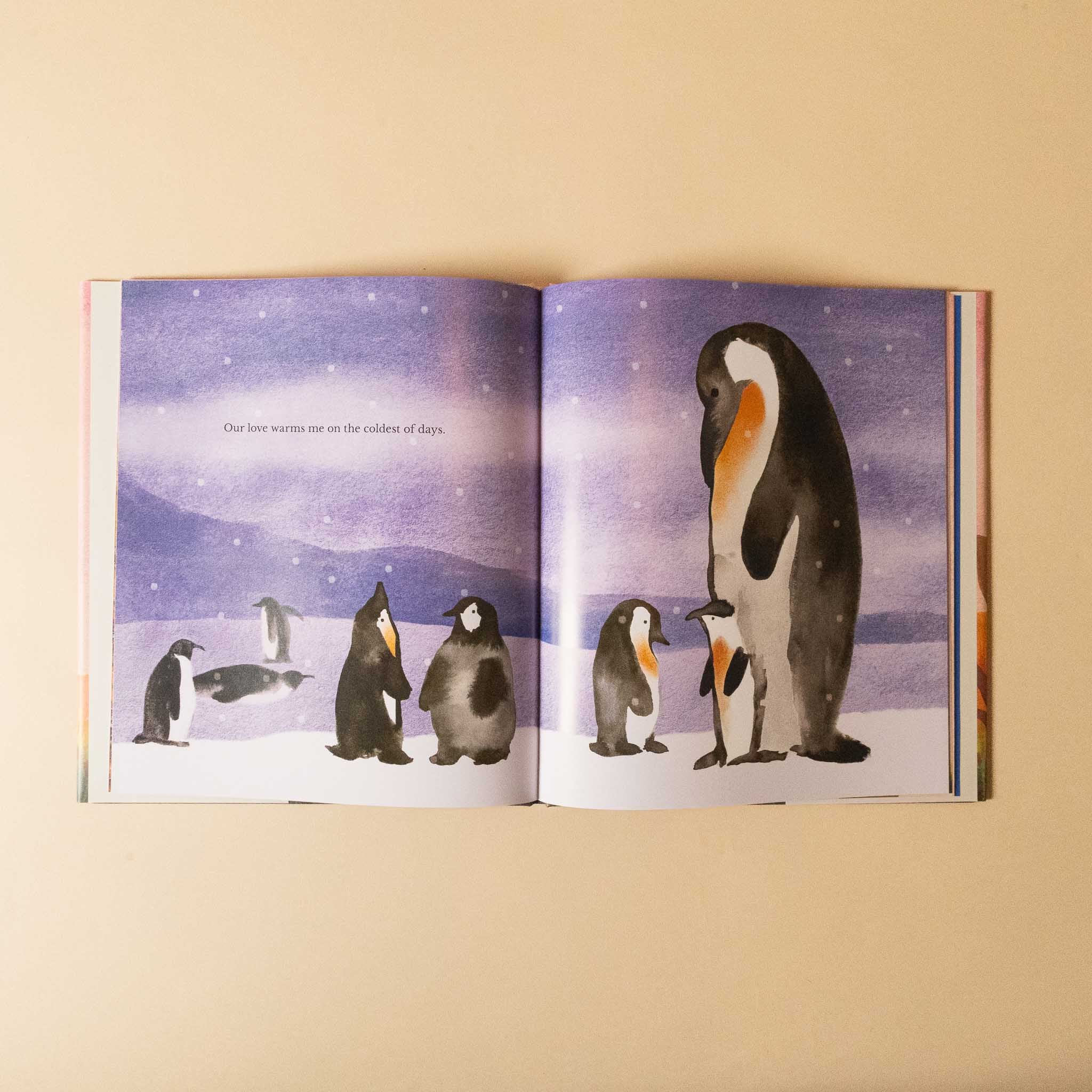 our-love-book-open-to-page-with-penguines