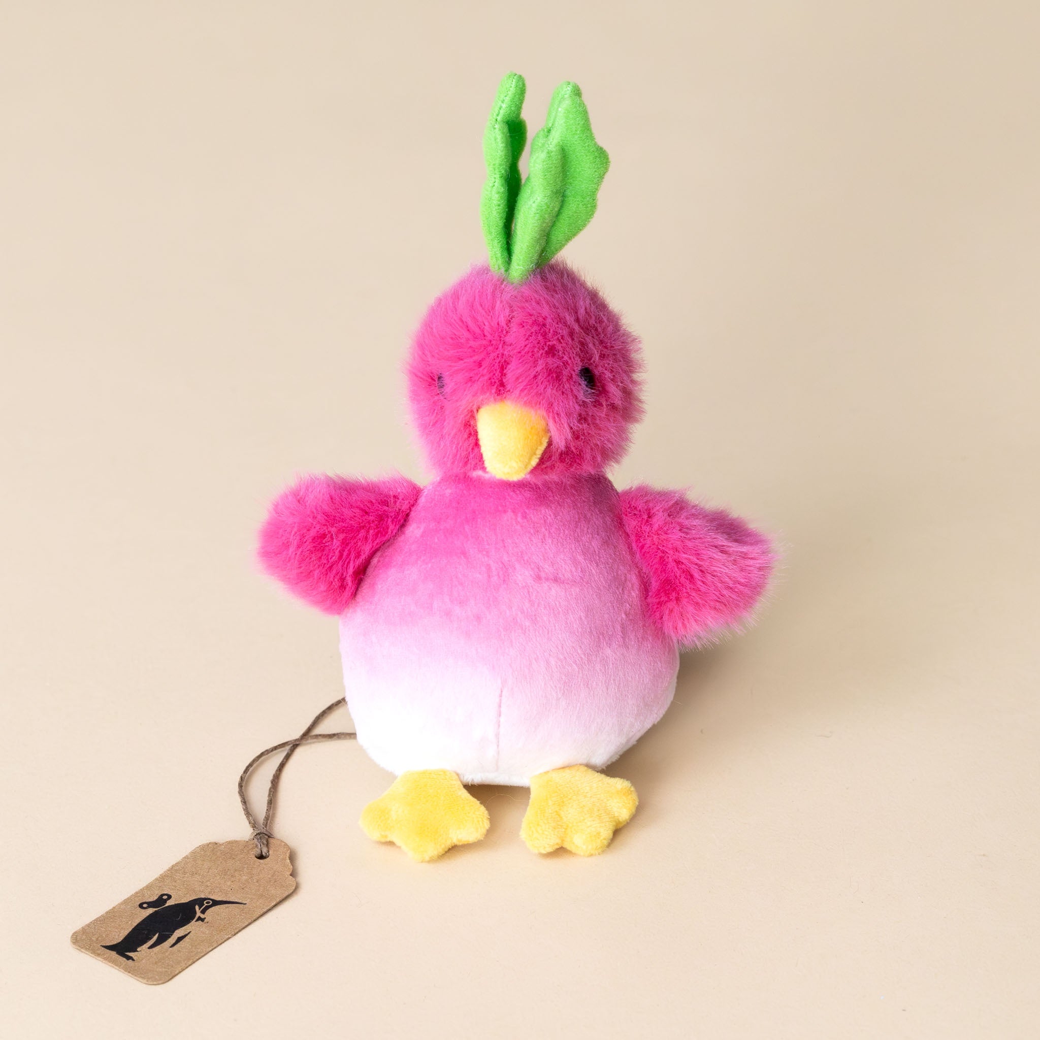 petite-radichick-pink-white-bird-with-green-leafy-crown-and-yellow-feet-and-beak