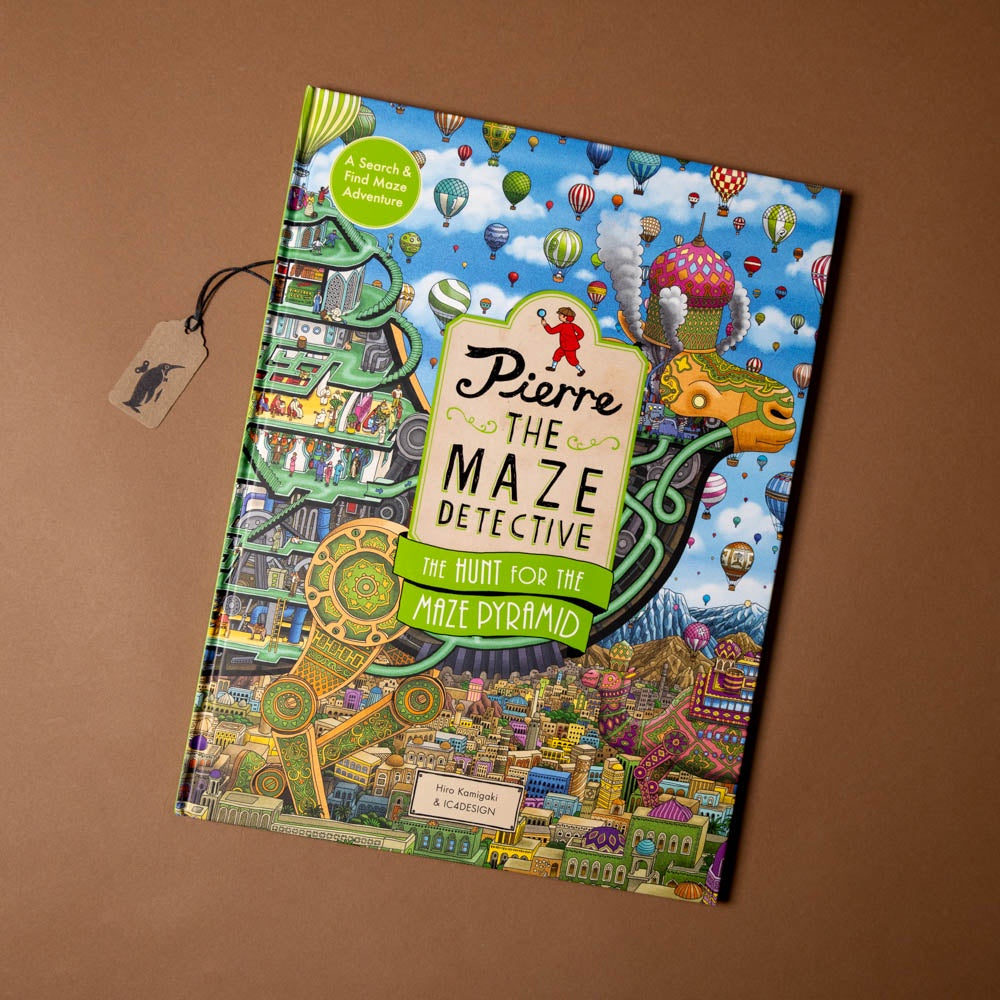 Book titled 'Pierre the Maze Detective: The Hunt for the Maze Pyramid' on a brown background