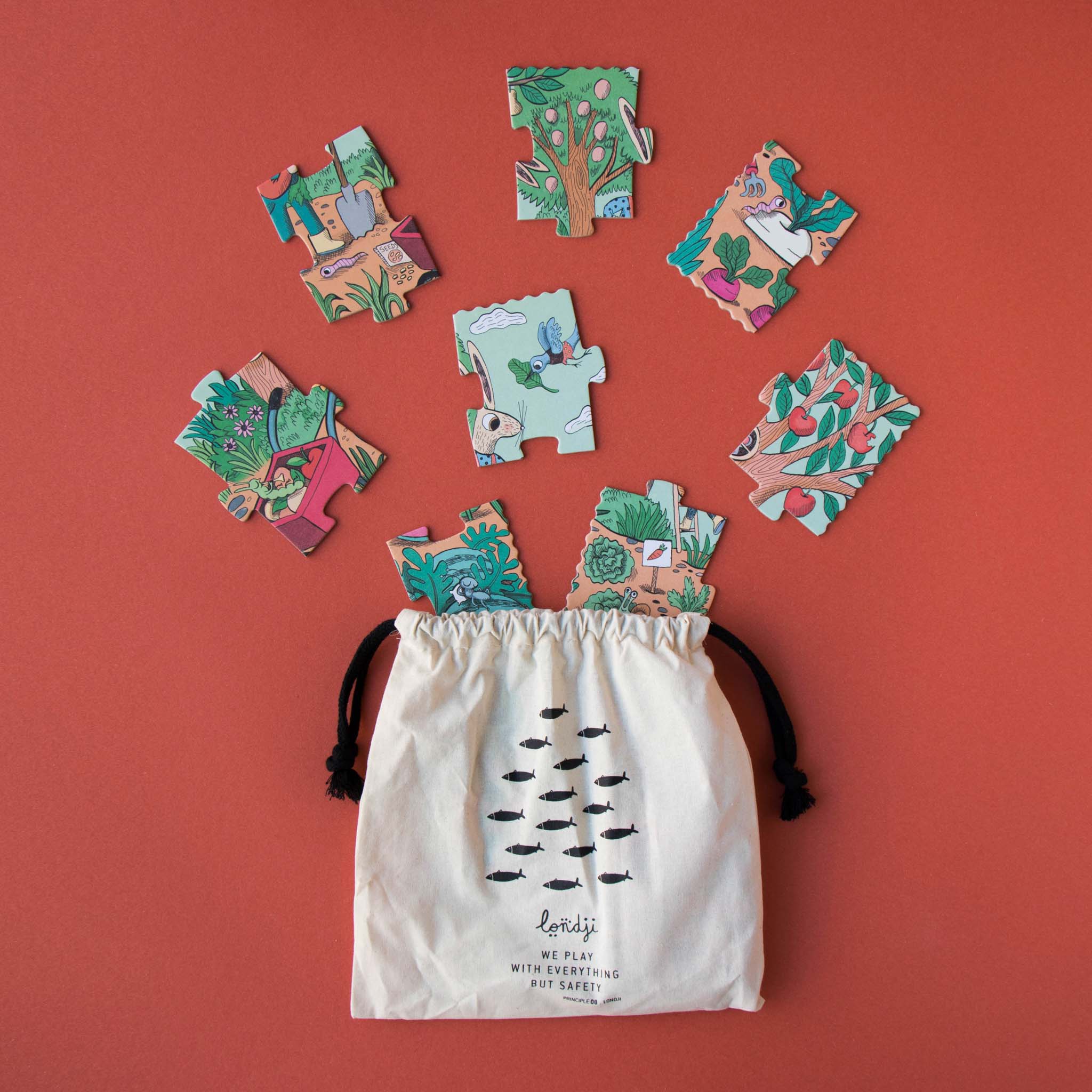 rabbits-garden-puzzle-box-with-rabbit-mouse-in-the-green-garden-carrying-bag-and-pieces