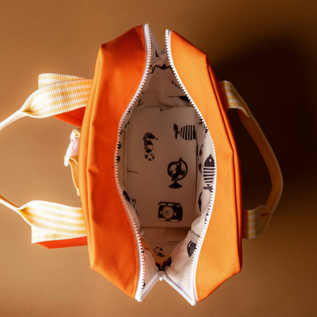 recycled-wonders-envelope-backpack-medium-lifebuoy-orange-with-a-blue-pocket-orange-striped-straps-open