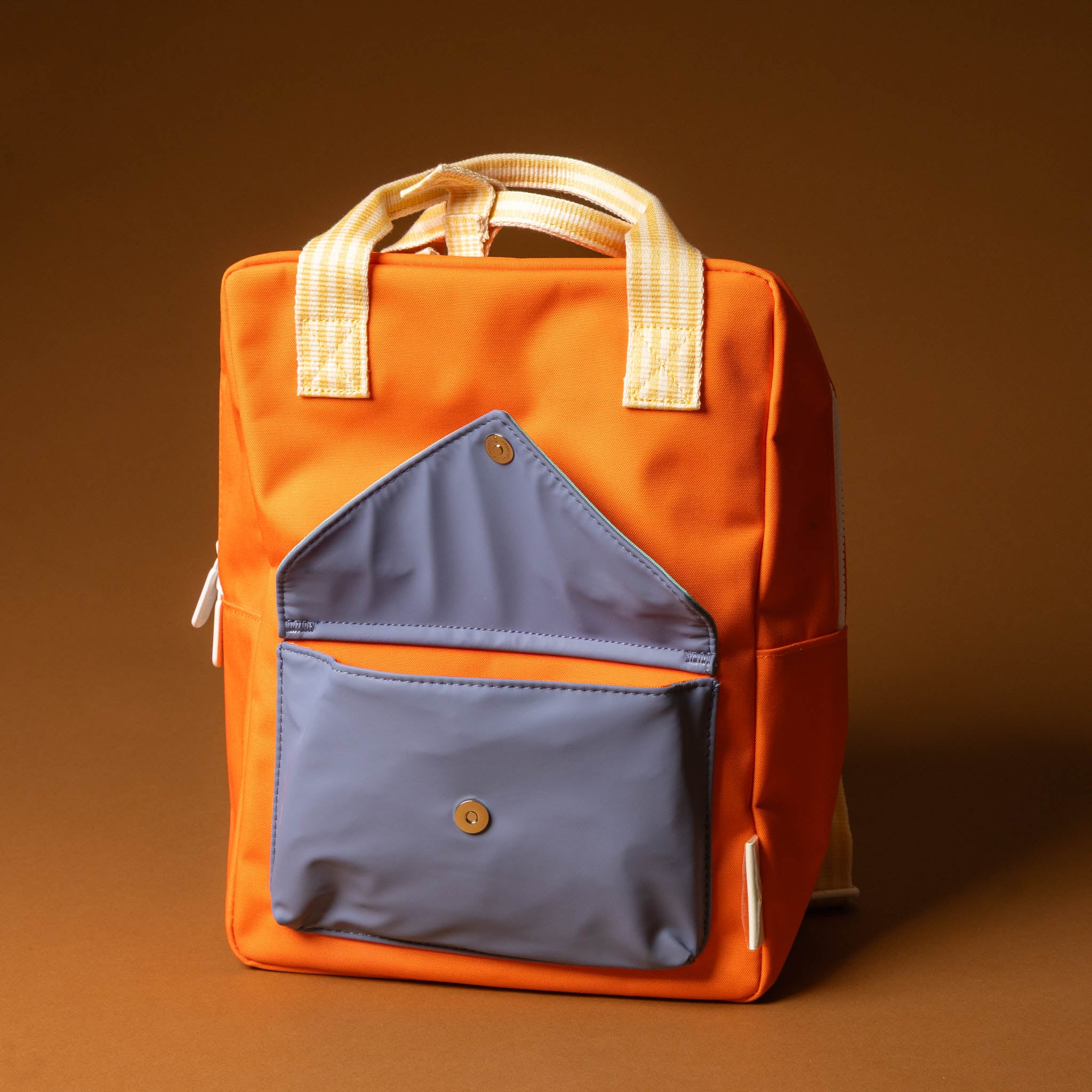 recycled-wonders-envelope-backpack-medium-lifebuoy-orange-with-a-blue-pocket-open-orange-striped-straps