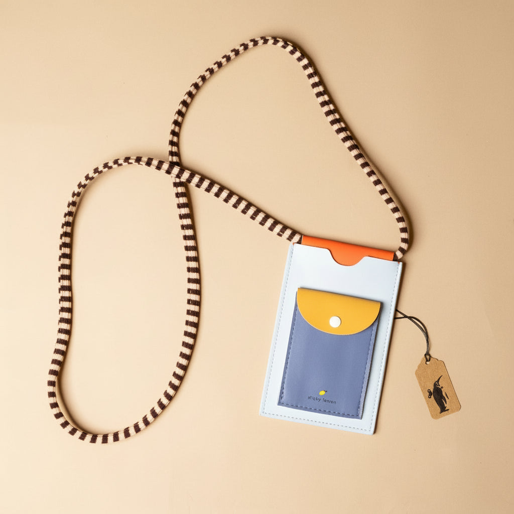 recycled-wonders-phone-pouch-blue-whale-with-black-and-tan-striped-strap