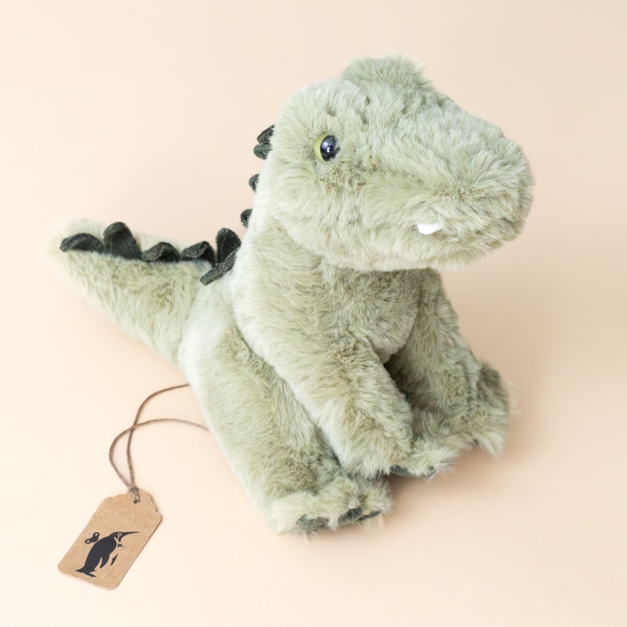 rex-the-alligator-sitting---small-with-jagged-scales-and-teeth