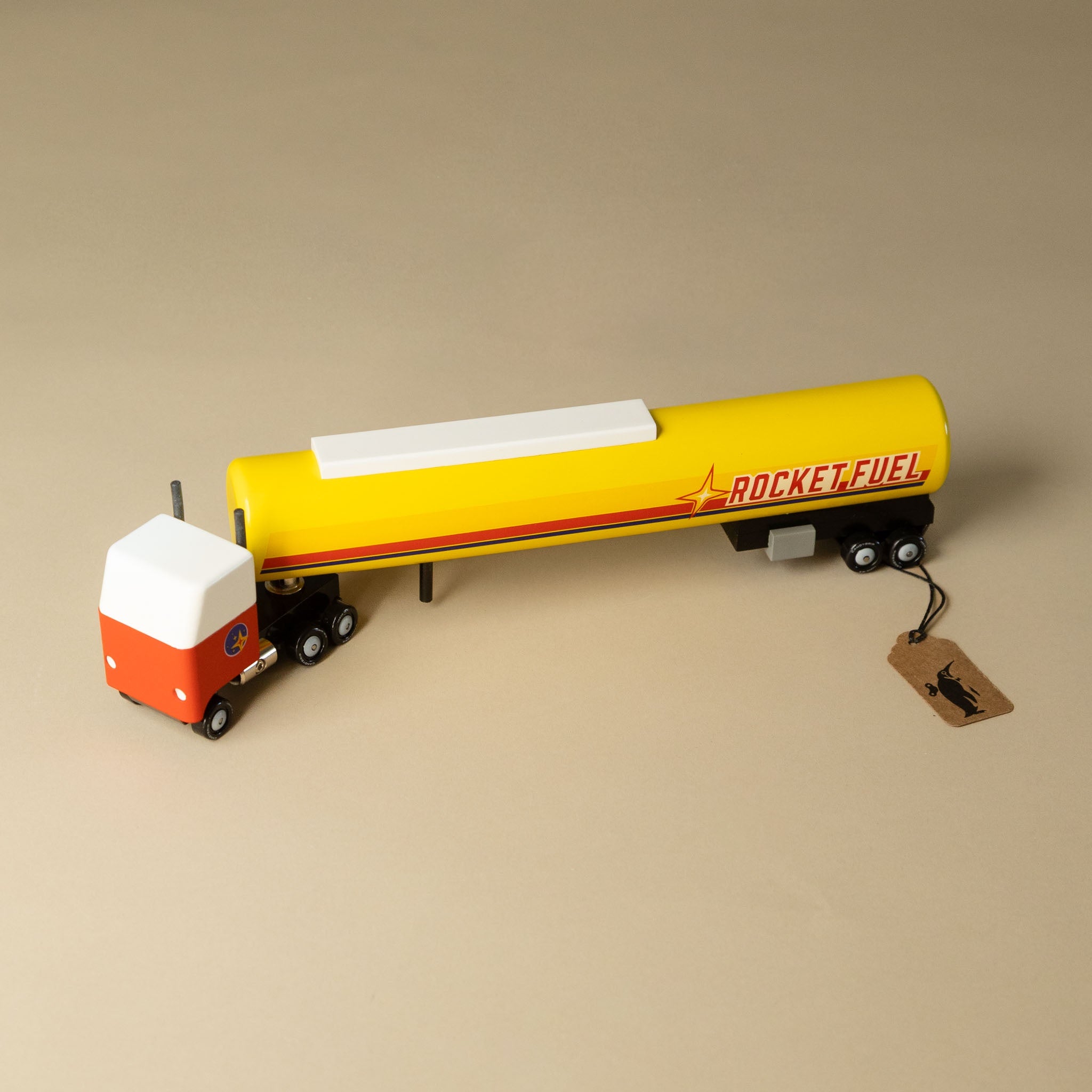 rocket-fuel-tanker with a yellow tanker labeled 'Rocket Fuel' on a beige background