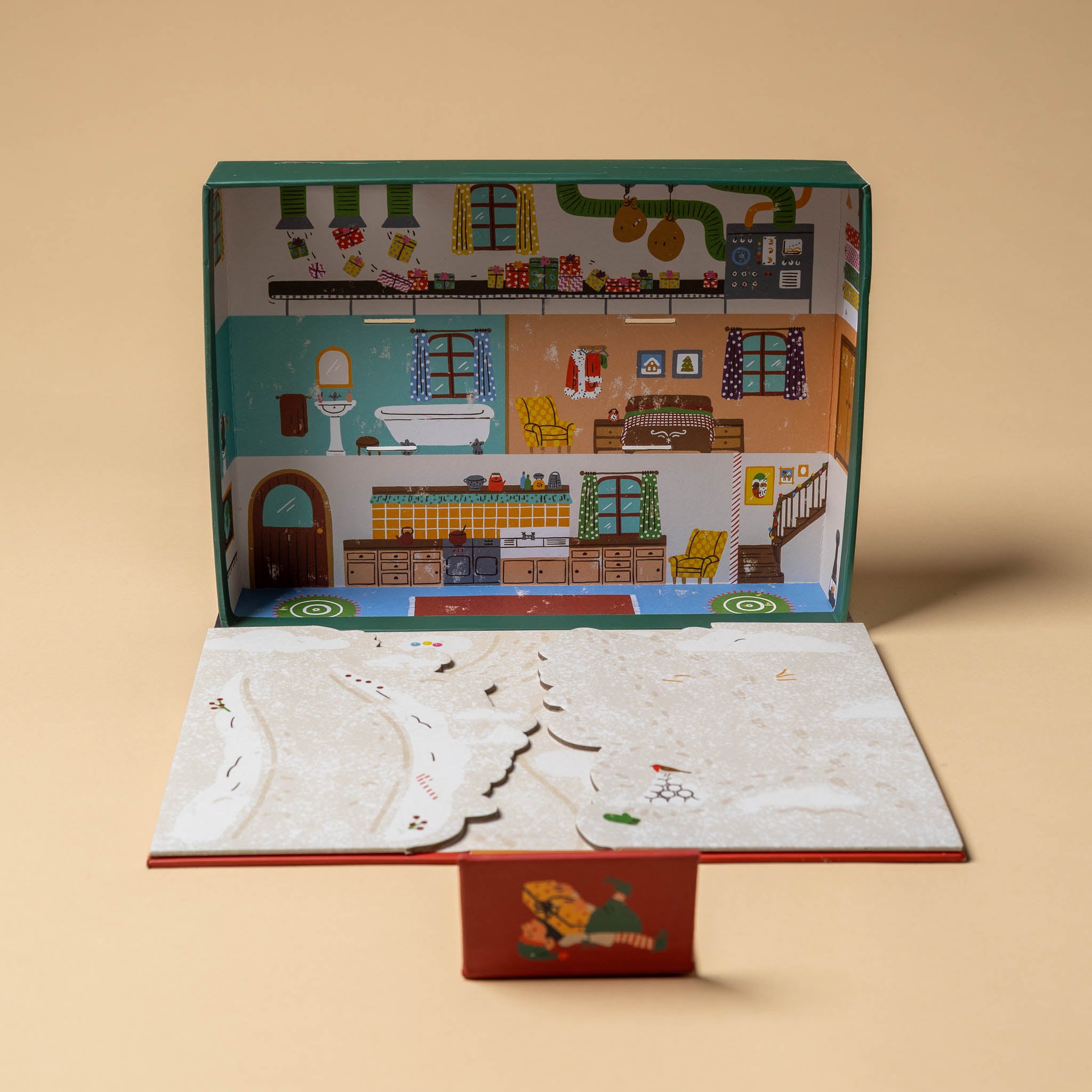 santas-workshop-a-pop-and-play-activity-kit Toy house set with detailed interior on a beige background