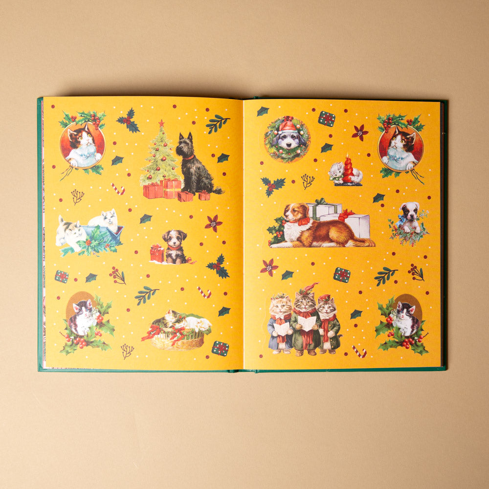 stickertopium-enchanted-christmas Open book with Christmas-themed sticker illustrations of dogs and cats on a yellow background.