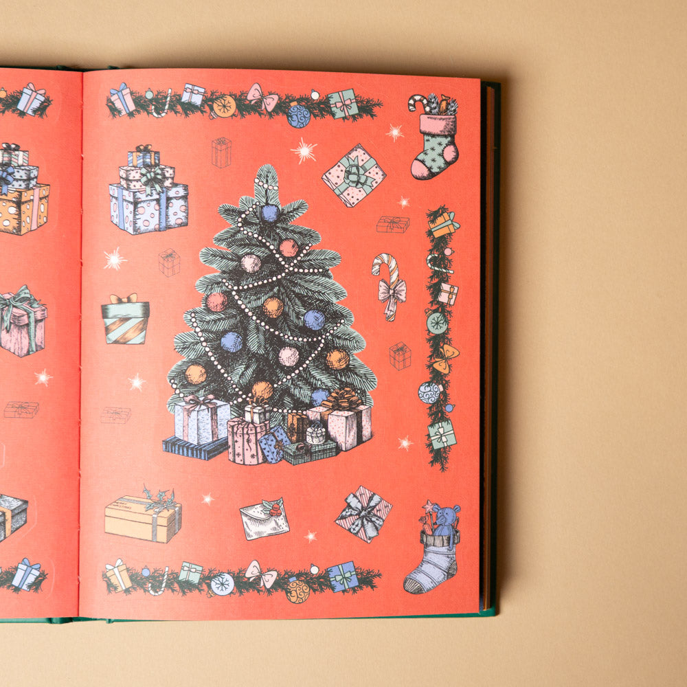 stickertopium-enchanted-christmas Open book with Christmas-themed sticker illustrations on a beige background